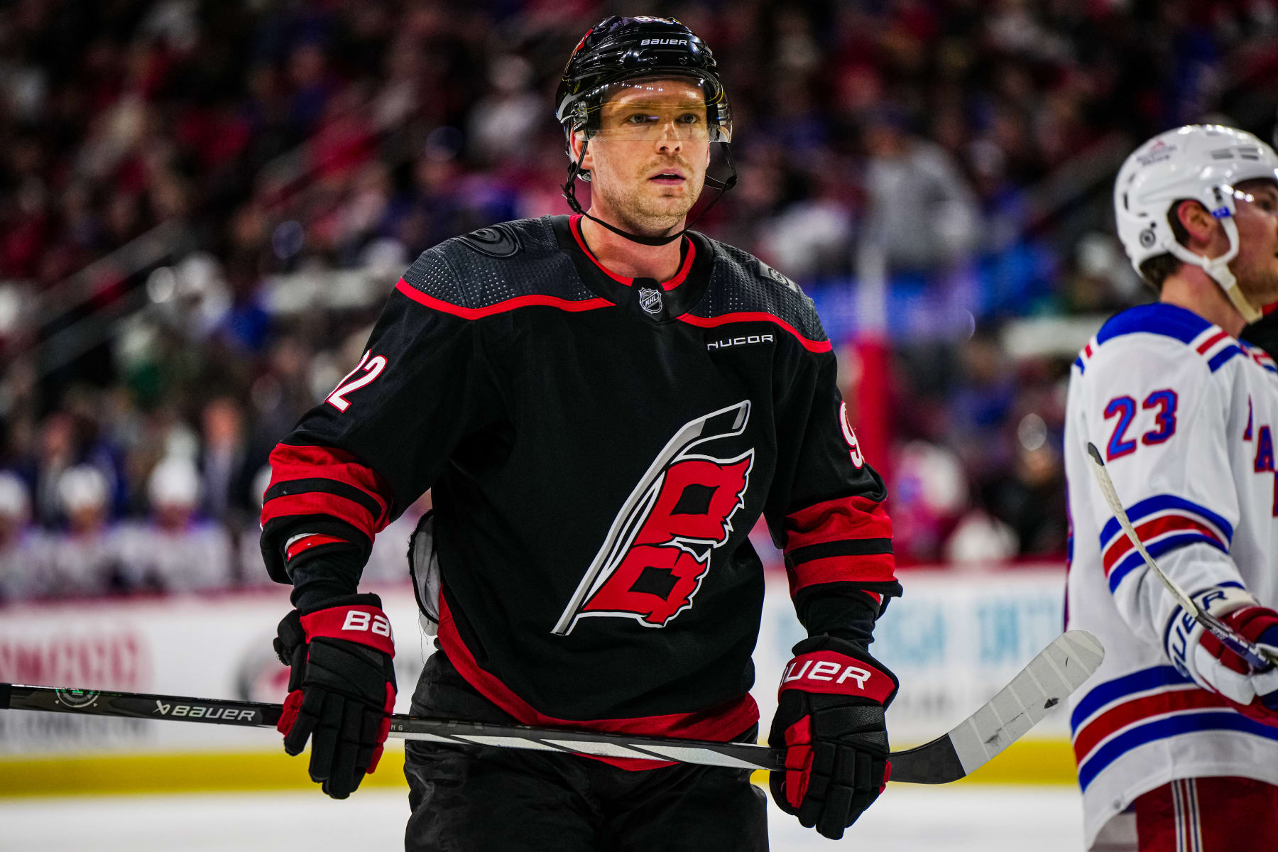 RALEIGH, NORTH CAROLINA - MARCH 12:  Evgeny Kuznetsov #92 of the Carolina Hurricanes looks on during the second period against the New York Rangers at PNC Arena on March 12, 2024 in Raleigh, North Carolina. (Photo by Cato Cataldo/NHLI via Getty Images)
