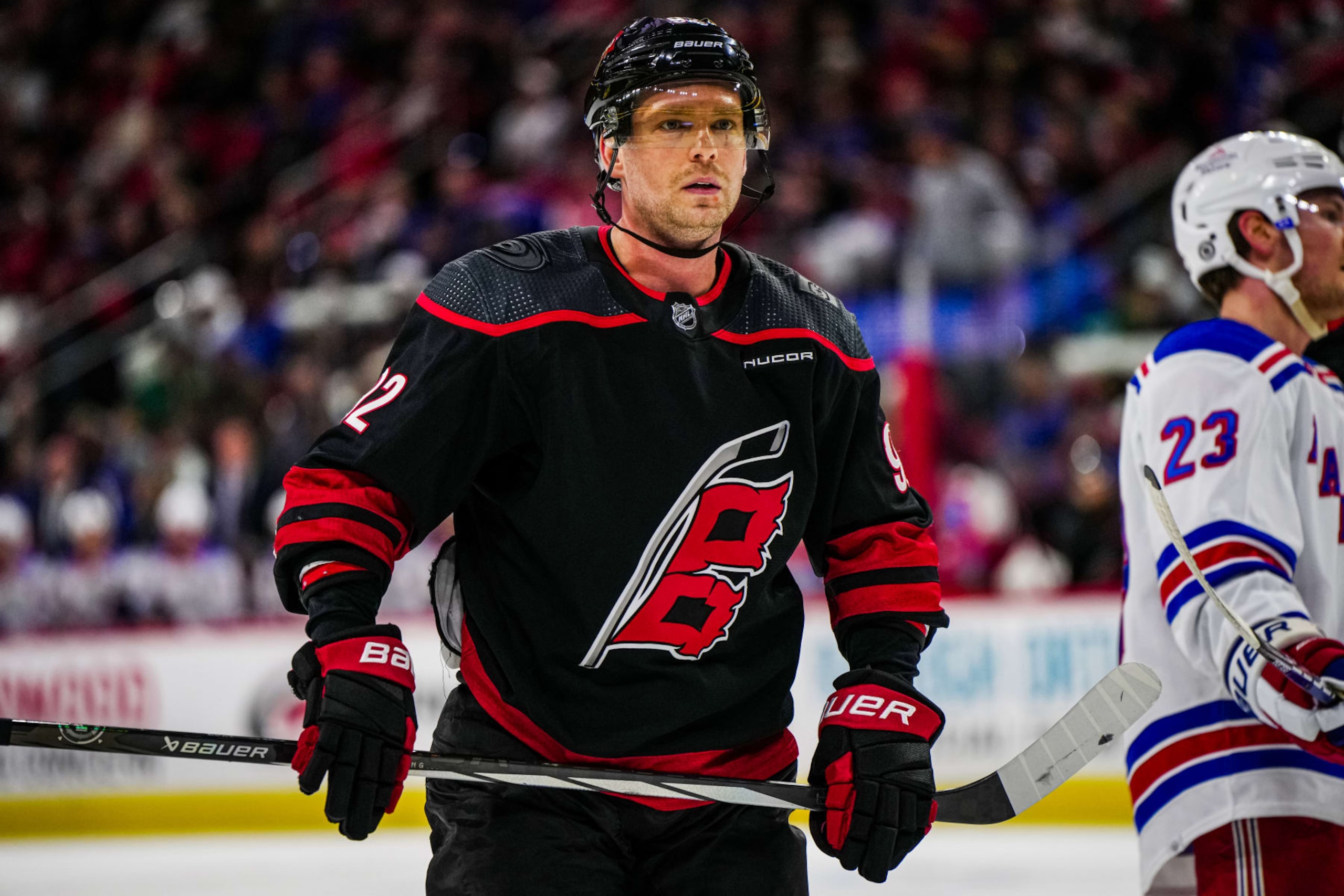 RALEIGH, NORTH CAROLINA - MARCH 12:  Evgeny Kuznetsov #92 of the Carolina Hurricanes looks on during the second period against the New York Rangers at PNC Arena on March 12, 2024 in Raleigh, North Carolina. (Photo by Cato Cataldo/NHLI via Getty Images)