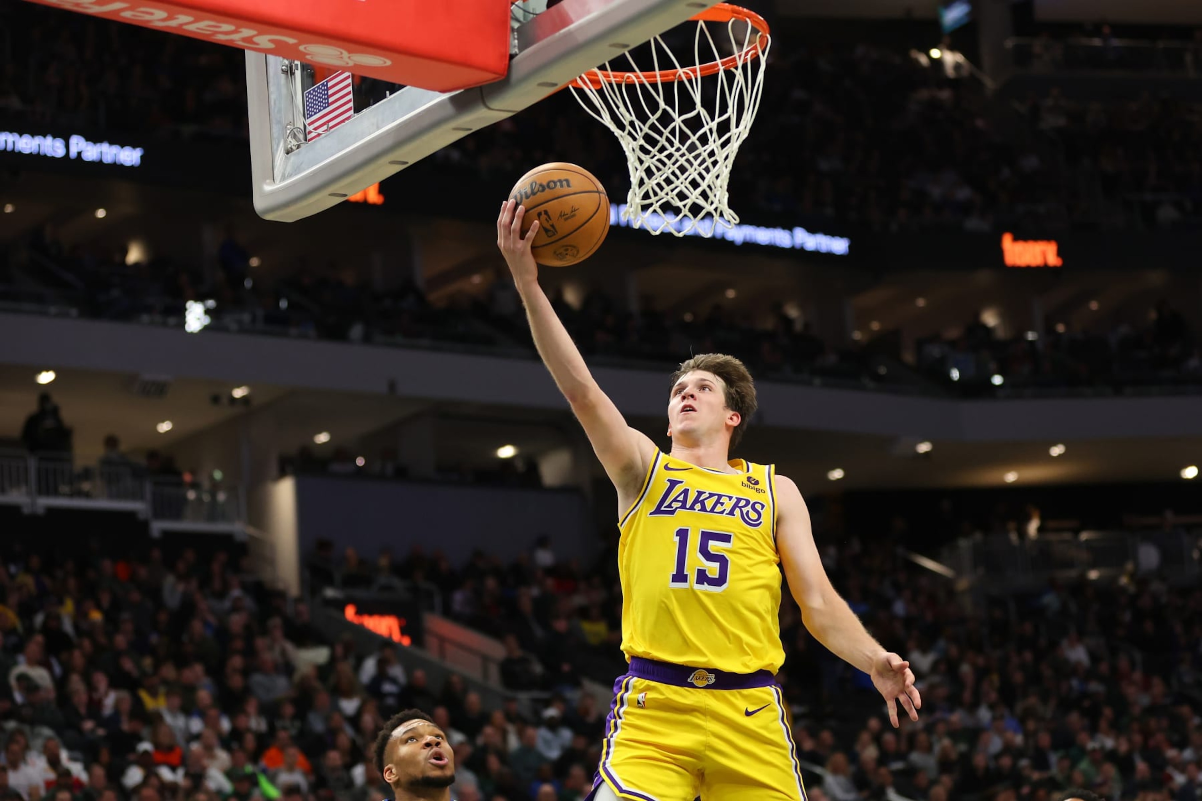 MILWAUKEE, WISCONSIN - MARCH 26: Austin Reaves #15 of the Los Angeles Lakers drives to the basket during the second half of a game against the Milwaukee Bucks at Fiserv Forum on March 26, 2024 in Milwaukee, Wisconsin. The Lakers defeated the bucks in double overtime. NOTE TO USER: User expressly acknowledges and agrees that, by downloading and or using this photograph, User is consenting to the terms and conditions of the Getty Images License Agreement. (Photo by Stacy Revere/Getty Images) MILWAUKEE, WISCONSIN - MARCH 26: Austin Reaves #15 of the Los Angeles Lakers drives to the basket during the second half of a game against the Milwaukee Bucks at Fiserv Forum on March 26, 2024 in Milwaukee, Wisconsin. The Lakers defeated the bucks in double overtime. NOTE TO USER: User expressly acknowledges and agrees that, by downloading and or using this photograph, User is consenting to the terms and conditions of the Getty Images License Agreement. (Photo by Stacy Revere/Getty Images)