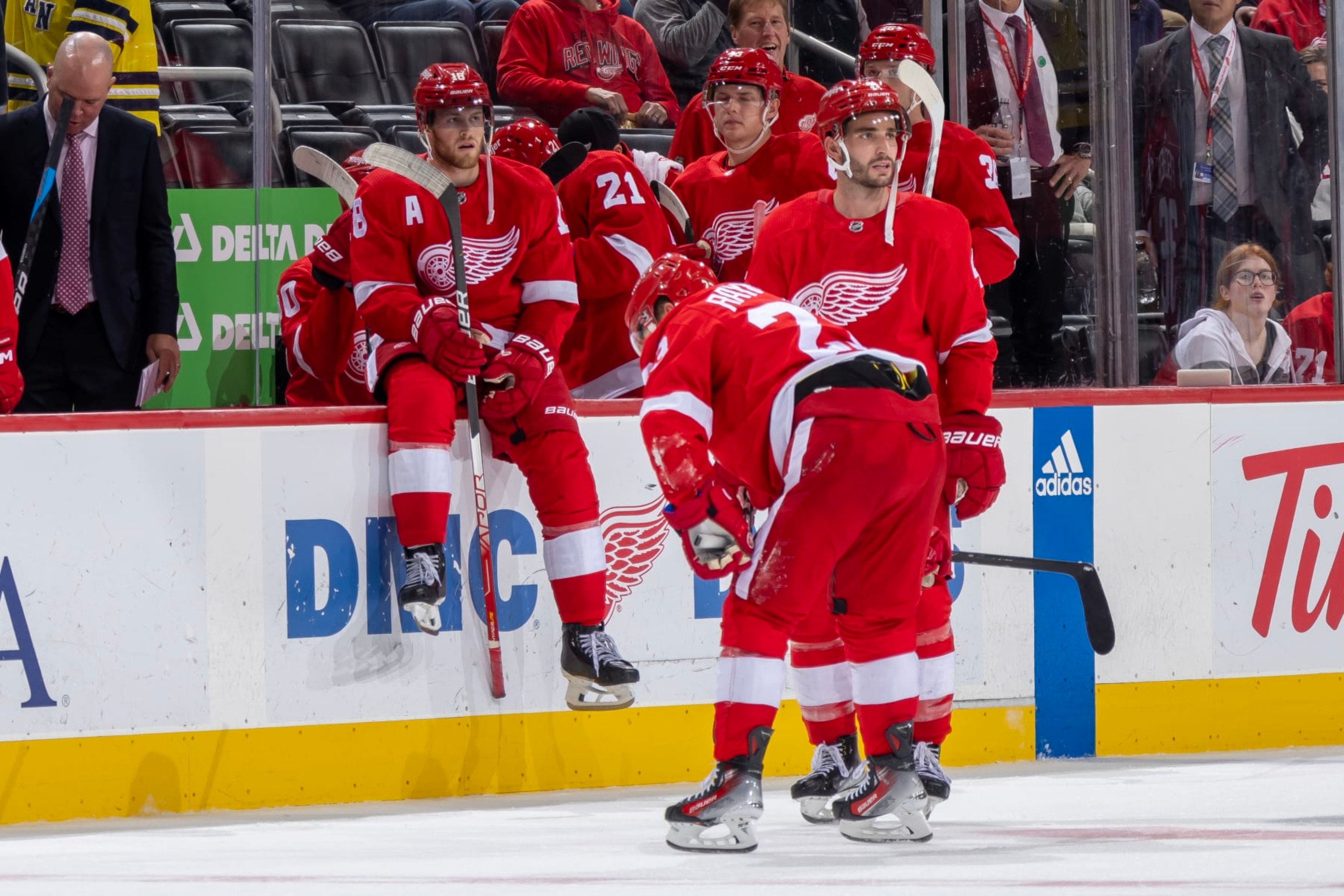 DETROIT, MI - OCTOBER 24: A dejected Lucas Raymond #23 of the Detroit Red Wings skates off the ice after loosing in O.T. to the Seattle Kraken at Little Caesars Arena on October 24, 2023 in Detroit, Michigan. Seattle defeated Detroit 5-4 in O.T. (Photo by Dave Reginek/NHLI via Getty Images)
