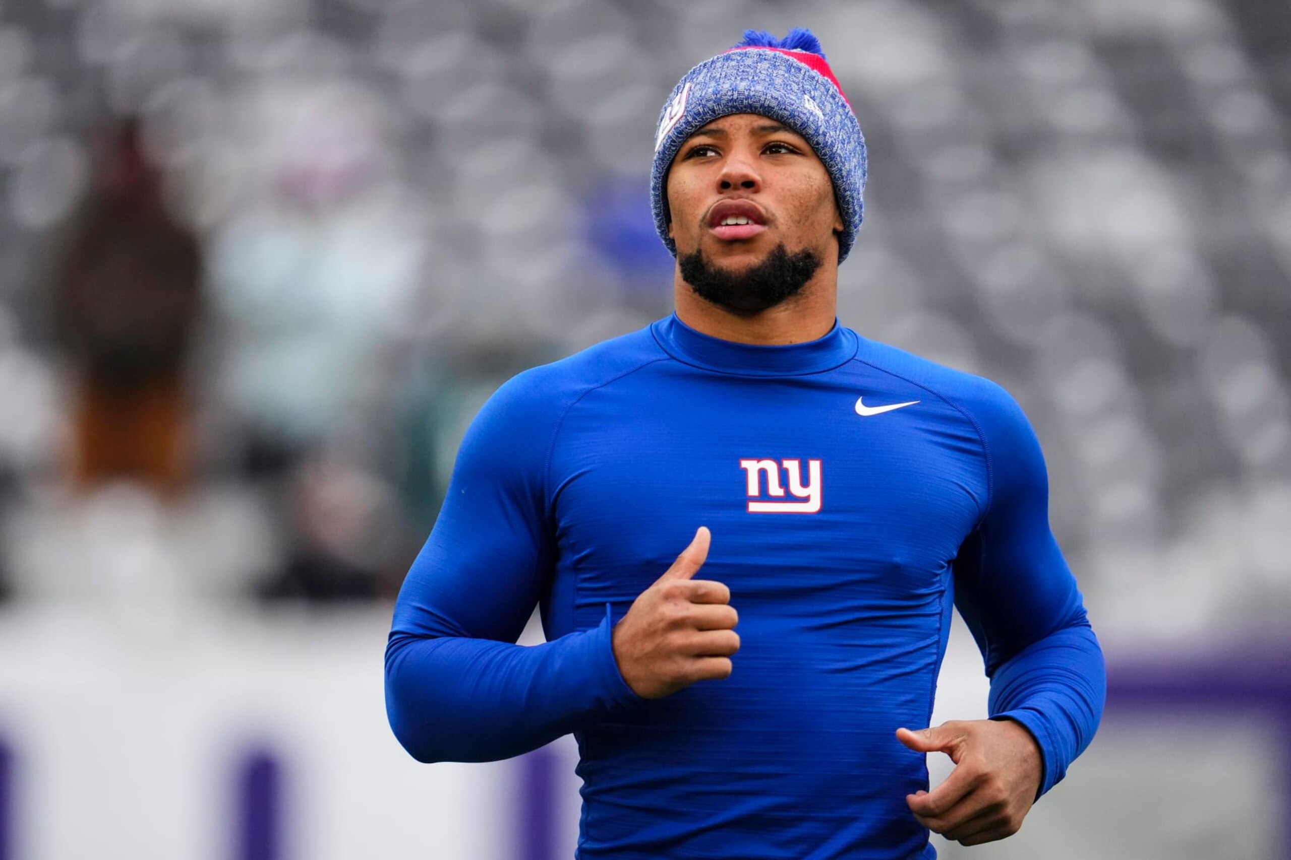 EAST RUTHERFORD, NJ - JANUARY 07: Saquon Barkley #26 of the New York Giants warms up prior to an NFL football game against the Philadelphia Eagles at MetLife Stadium on January 7, 2024 in East Rutherford, New Jersey. (Photo by Cooper Neill/Getty Images)