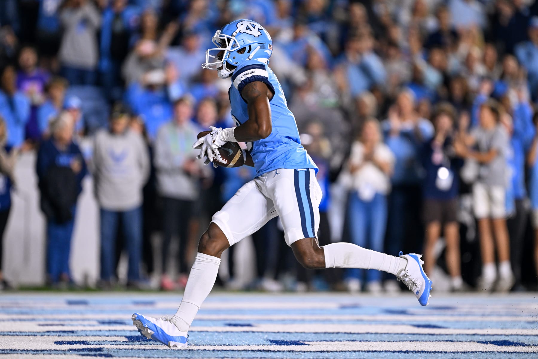CHAPEL HILL, NORTH CAROLINA - OCTOBER 14: Devontez Walker #9 of the North Carolina Tar Heels makes a touchdown catduring the second half of their game at Kenan Memorial Stadium on October 14, 2023 in Chapel Hill, North Carolina. The Tar Heels won 41-31. (Photo by Grant Halverson/Getty Images)