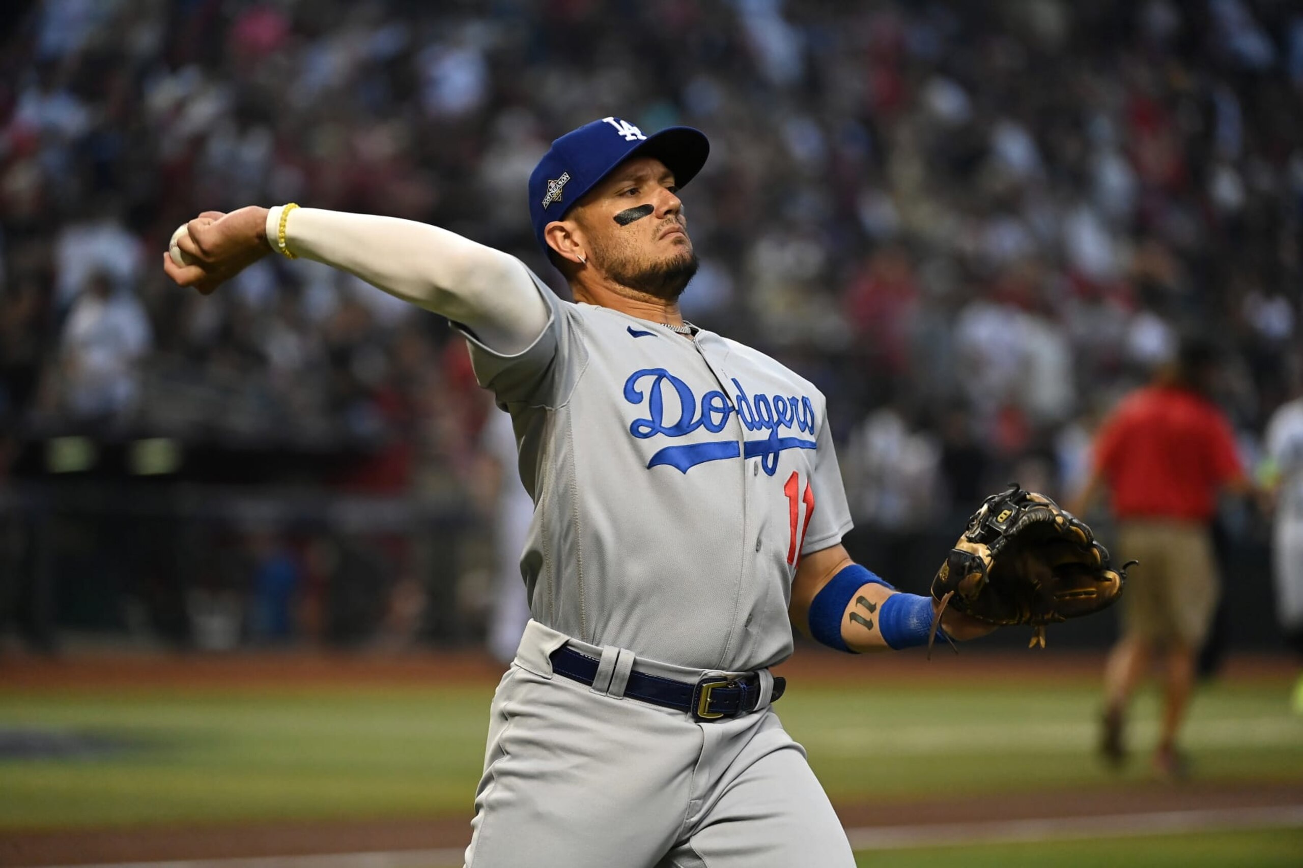 PHOENIX, ARIZONA - OCTOBER 11: Miguel Rojas #11 of the Los Angeles Dodgers prepares for Game Three of the Division Series against the Arizona Diamondbacks at Chase Field on October 11, 2023 in Phoenix, Arizona. (Photo by Norm Hall/Getty Images) PHOENIX, ARIZONA - OCTOBER 11: Miguel Rojas #11 of the Los Angeles Dodgers prepares for Game Three of the Division Series against the Arizona Diamondbacks at Chase Field on October 11, 2023 in Phoenix, Arizona. (Photo by Norm Hall/Getty Images)