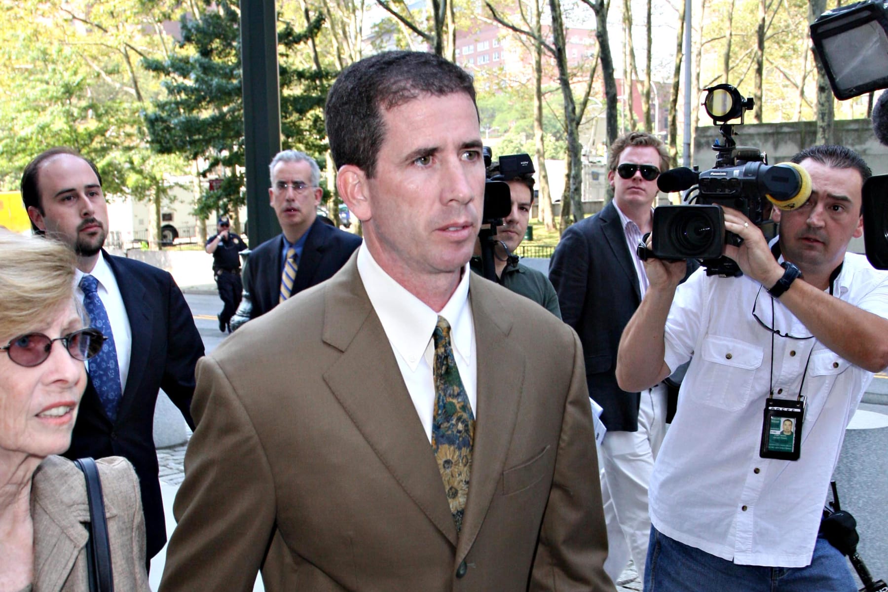 UNITED STATES - JULY 29:  Tim Donaghy, a former referee for the National Basketball Association (NBA), center, arrives at Federal District Court in the Brooklyn borough of New York, U.S., on Tuesday, July 29, 2008. Lawyers for Donaghy, who pleaded guilty to illegally betting on games, said his sentence should be limited because he was addicted to gambling, the New York Times reported.  (Photo by Rick Maiman/Bloomberg via Getty Images)