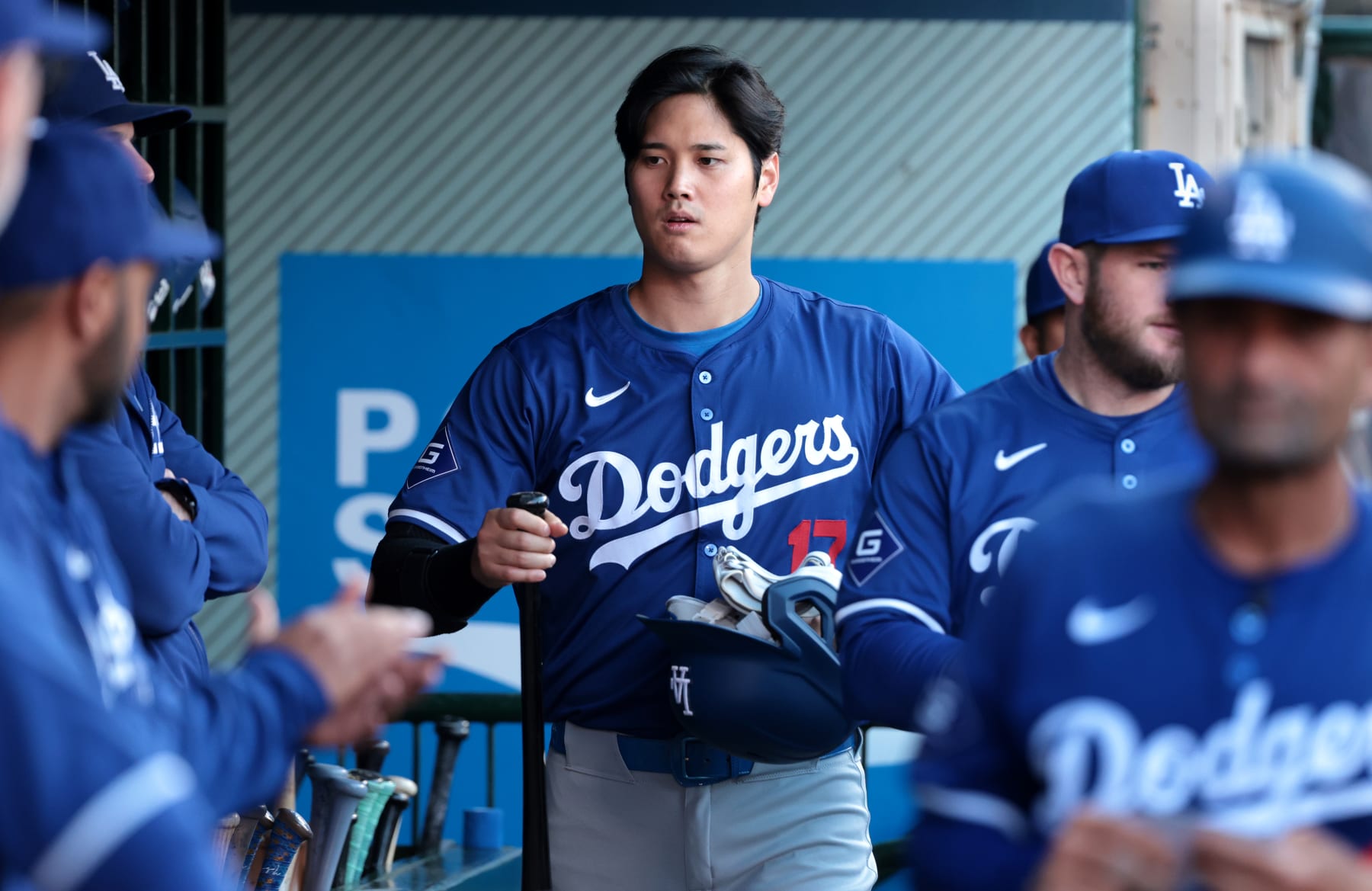 ANAHEIM, CALIFORNIA - MARCH 26: Dodgers Shohei Ohtani walks back into he dugout after striking out against the Angels in the first inning at Angels Stadium Tuesday. (Wally Skalij/Los Angeles Times via Getty Images)