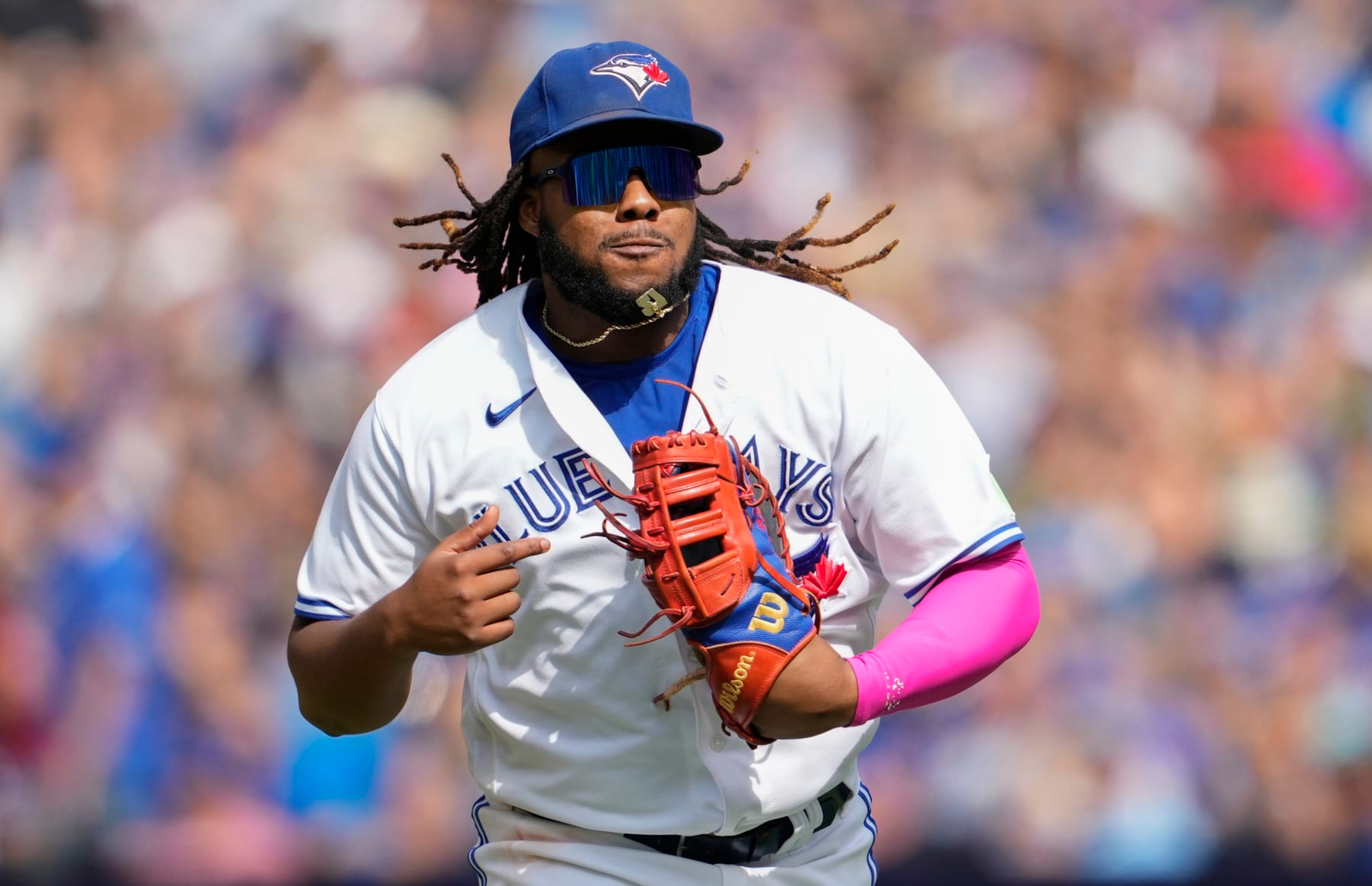 TORONTO, ON - SEPTEMBER 17: Vladimir Guerrero Jr. #27 of Toronto Blue Jays runs off the field against the Boston Red Sox during the third inning in their MLB game at the Rogers Centre on September 17, 2023 in Toronto, Ontario, Canada. (Photo by Mark Blinch/Getty Images)