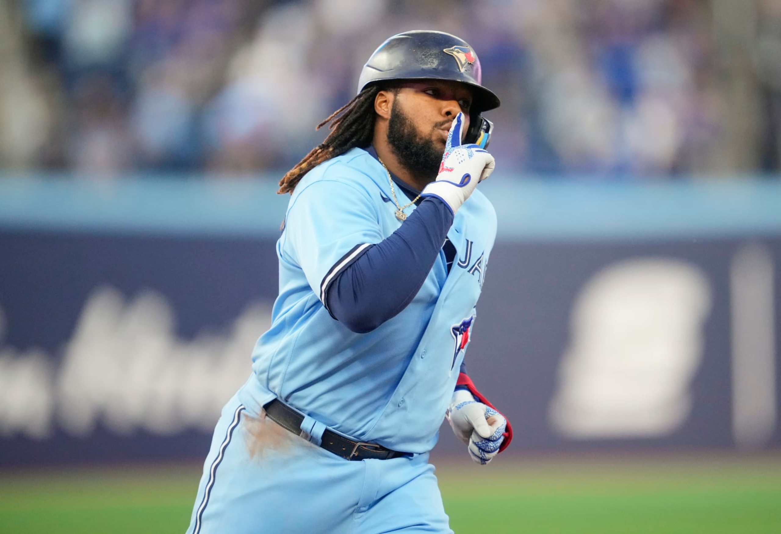 TORONTO, ON - SEPTEMBER 14: Vladimir Guerrero Jr. #27 of the Toronto Blue Jays celebrates his home run during the first inning against the Texas Rangers at Rogers Centre on September 14, 2023 in Toronto, Canada. (Photo by Mark Blinch/Getty Images) TORONTO, ON - SEPTEMBER 14: Vladimir Guerrero Jr. #27 of the Toronto Blue Jays celebrates his home run during the first inning against the Texas Rangers at Rogers Centre on September 14, 2023 in Toronto, Canada. (Photo by Mark Blinch/Getty Images)