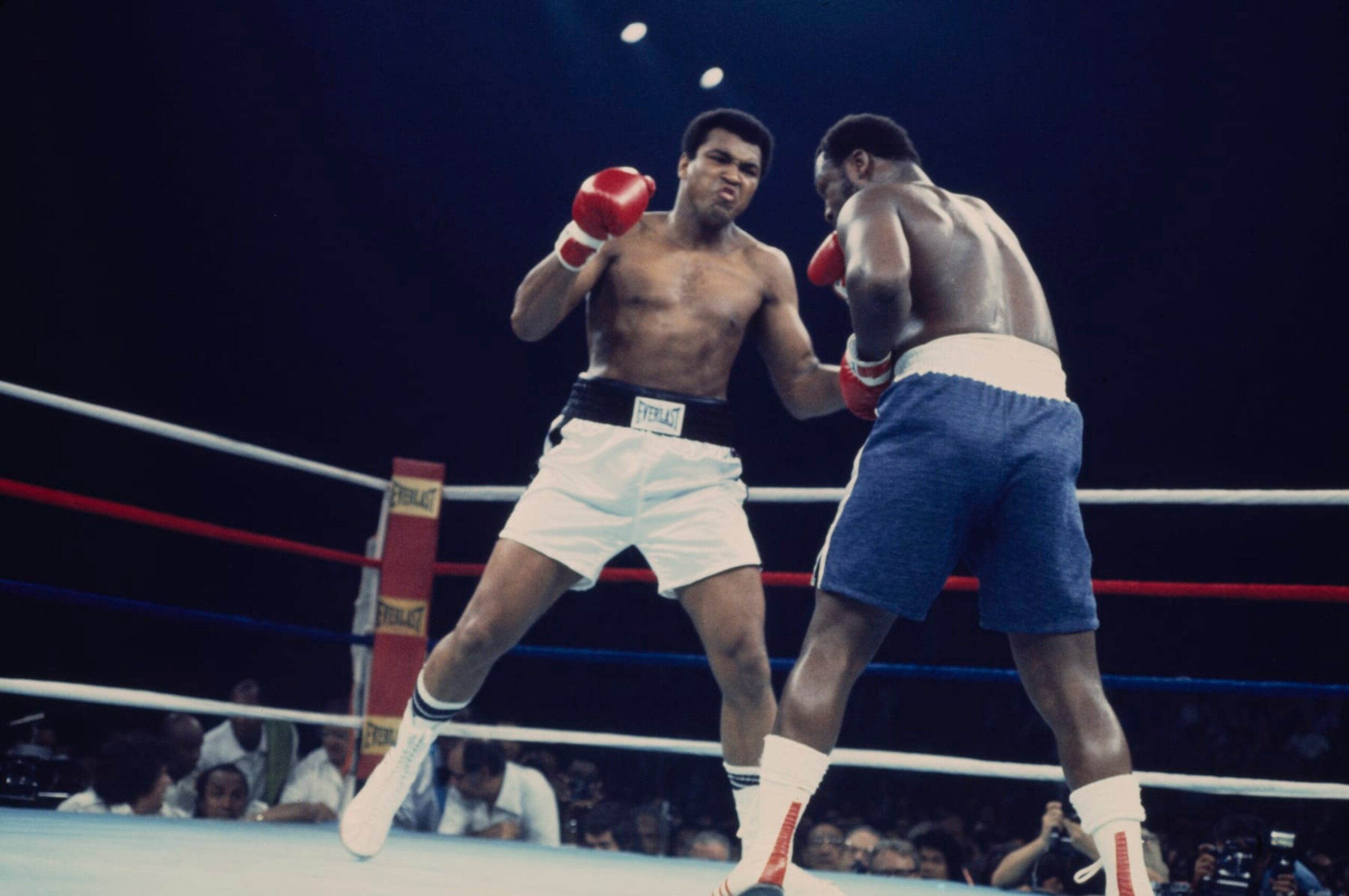 Heavyweight boxers Muhammad Ali (white shorts, 1942 - 2016) and Joe Frazier (1944 - 2011) in action during their championship bout in Quezon City, Manila, Philippines, October 1st 1975. (Photo by UPI/Bettmann/Getty Images)