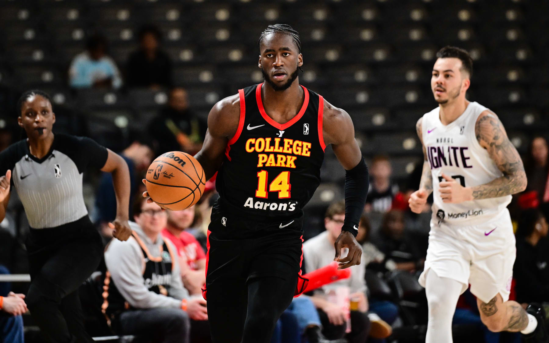 COLLEGE PARK, GA - MARCH 3rd: AJ Griffin #14 of the College Park Skyhawks brings the ball up court during the game against the G-League Ignite on March 3rd, 2024 at Gateway Center Arena in College Park, Georgia. NOTE TO USER: User expressly acknowledges and agrees that, by downloading and or using this photograph, user is consenting to the terms and conditions of Getty Images License Agreement. Mandatory Copyright Notice: Copyright 2024 NBAE (Photo by Adam Hagy/NBAE via Getty Images)