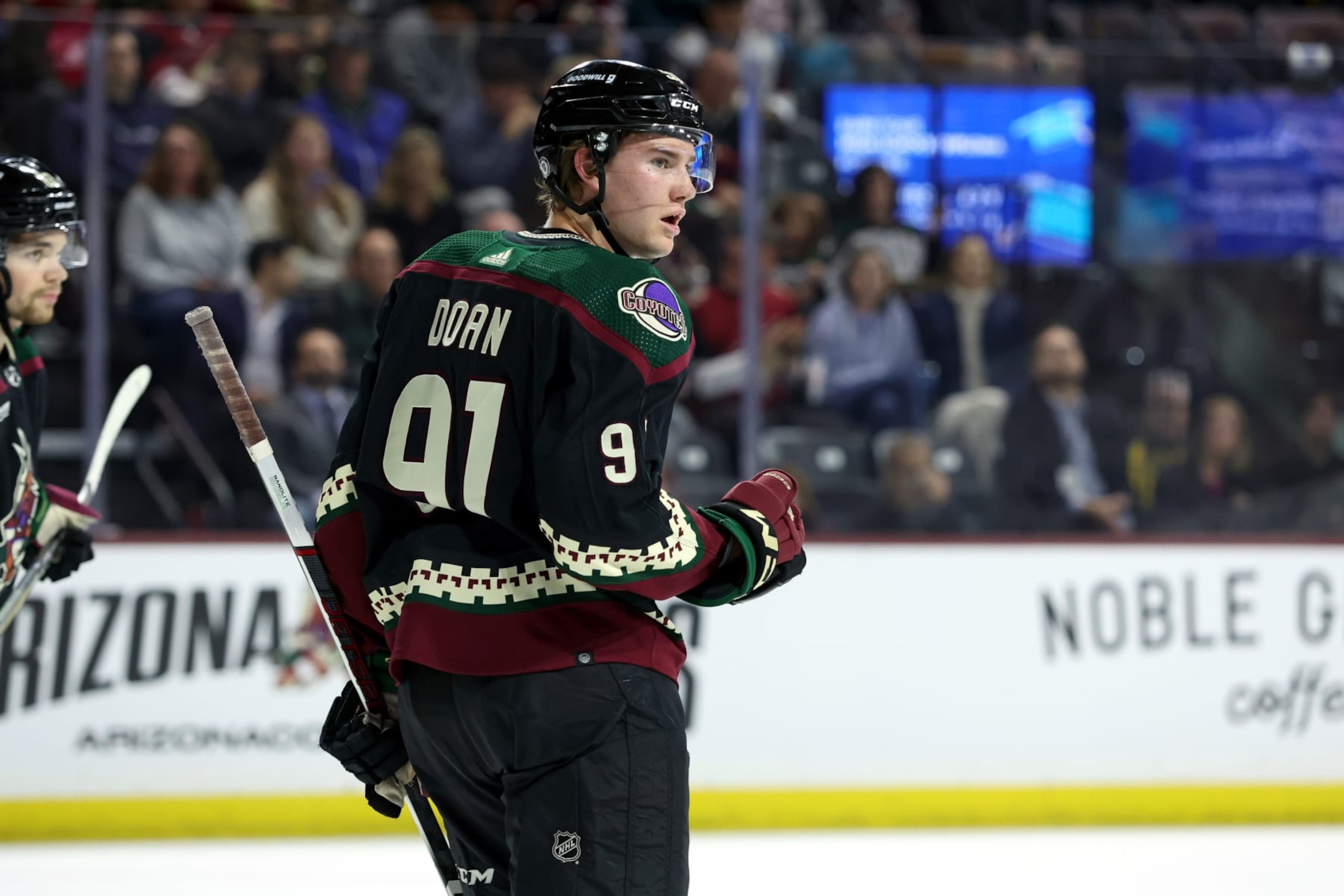 TEMPE, ARIZONA - MARCH 26: Josh Doan #91 of the Arizona Coyotes skates in his NHL debut against the Columbus Blue Jackets during the first period at Mullett Arena on March 26, 2024 in Tempe, Arizona. (Photo by Zac BonDurant/Getty Images)