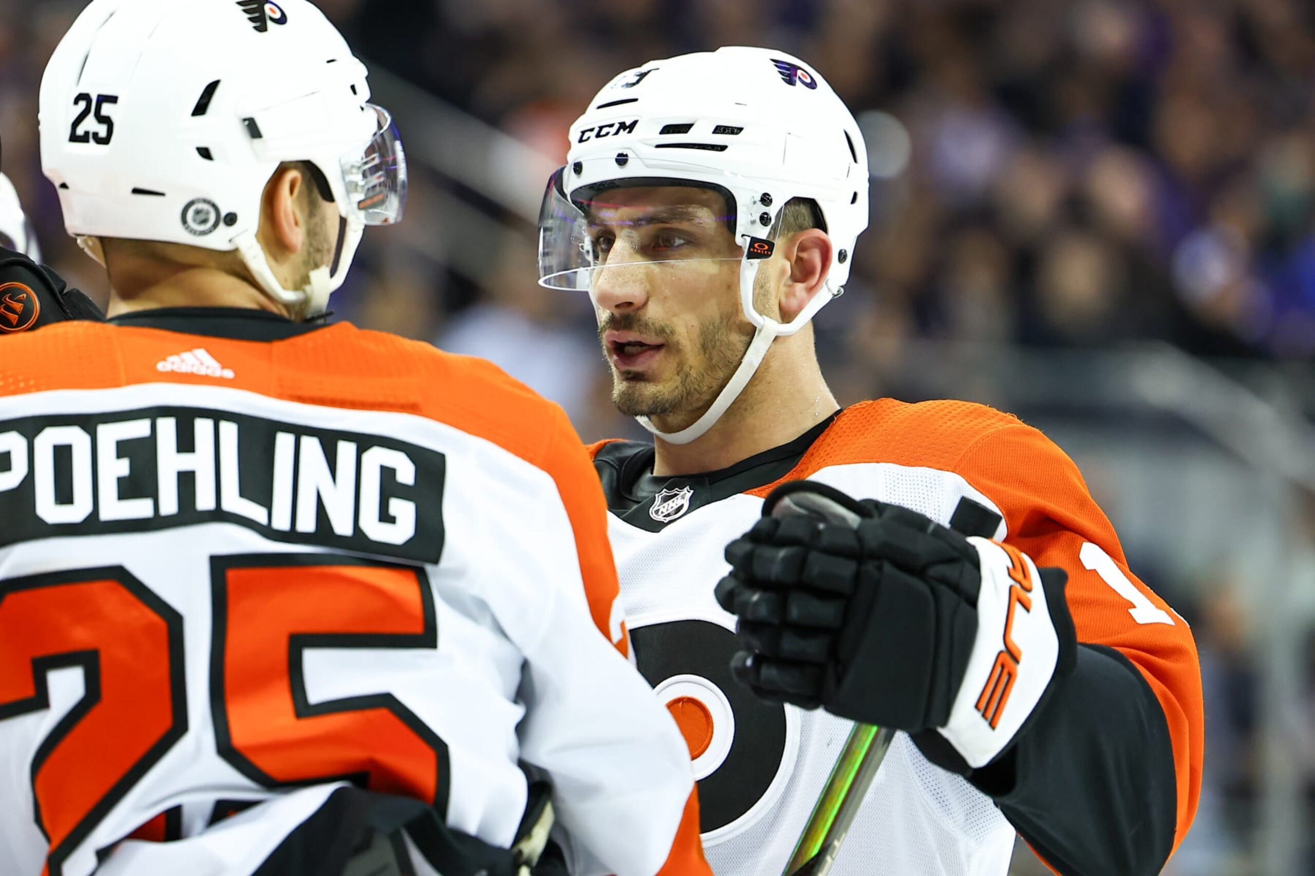 NEW YORK, NY - MARCH 26: Garnet Hathaway #19 of the Philadelphia Flyers talks with Ryan Poehling #25  during the game agaisnt the New York Rangers at Madison Square Garden on March 26, 2024 in New York, New York.  (Photo by Rich Graessle/Getty Images)