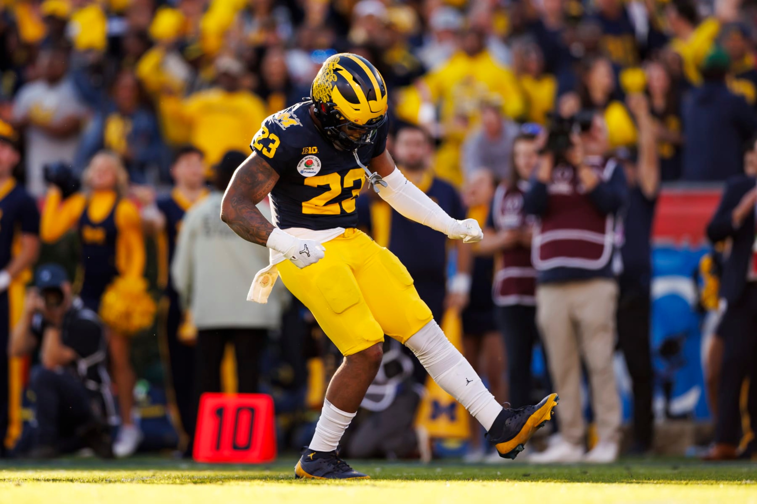 PASADENA, CALIFORNIA - JANUARY 01: Linebacker Michael Barrett #23 of the Michigan Wolverines celebrates after a play during the CFP Semifinal Rose Bowl Game against the Alabama Crimson Tide at Rose Bowl Stadium on January 1, 2024 in Pasadena, California. (Photo by Ryan Kang/Getty Images)