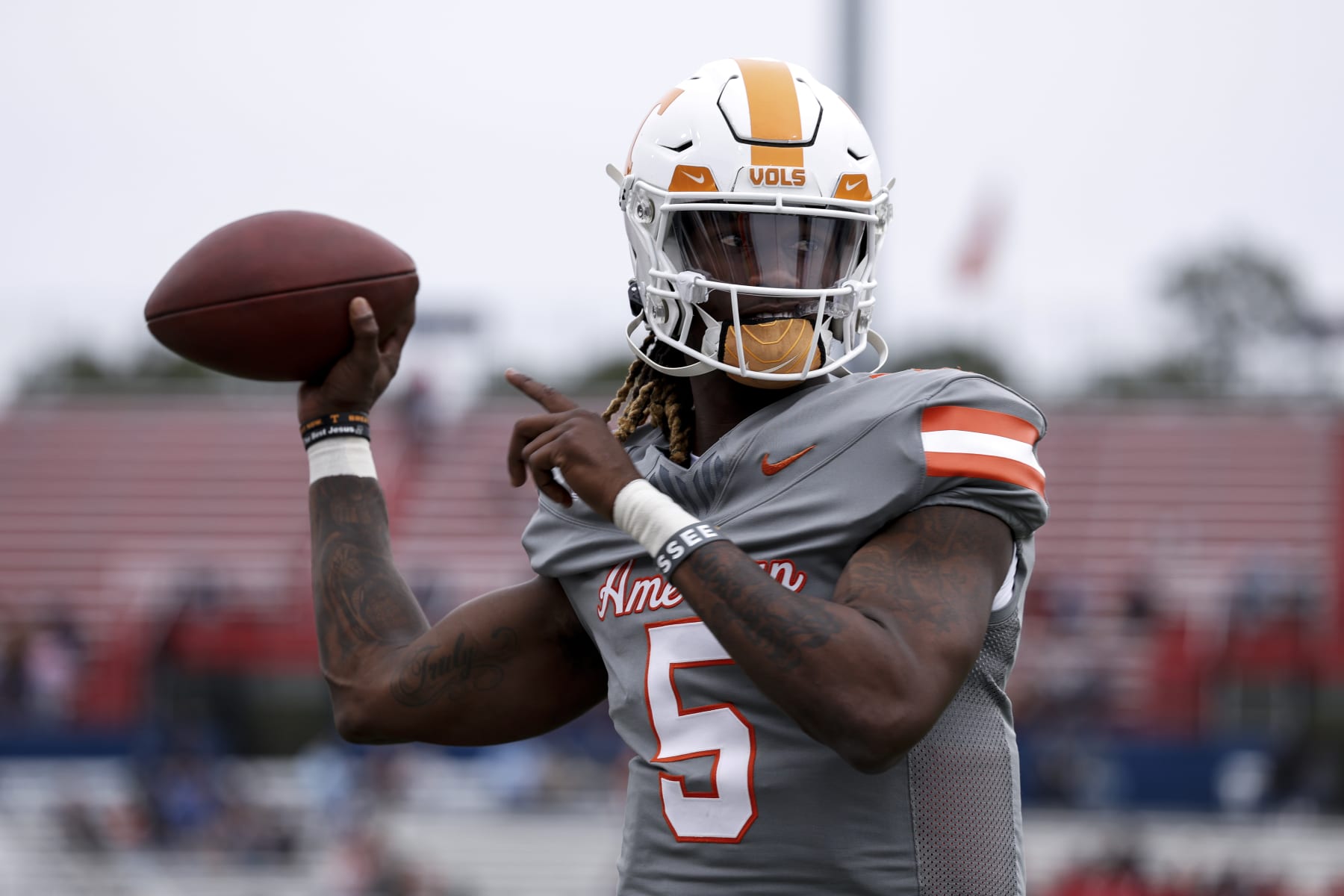 MOBILE, AL - FEBRUARY 03: Quarterback Joe Milton III #5 of Tennessee from the American Team warms up before the start of the 2024 Reese's Senior Bowl at Hancock Whitney Stadium on the campus of the University of South Alabama on February 3, 2024 in Mobile, Alabama. The National Team defeated the American Team 16 to 7. (Photo by Don Juan Moore/Getty Images)