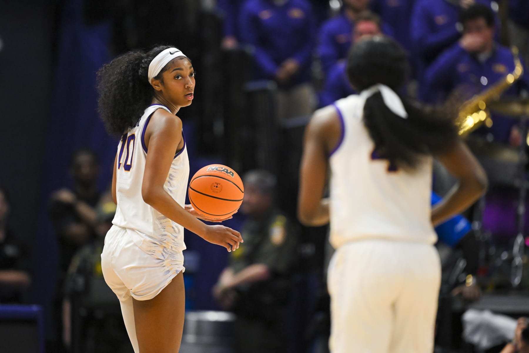 BATON ROUGE, LOUISIANA - MARCH 24: Angel Reese #10 of the LSU Tigers looks to Flau'jae Johnson #4 of the LSU Tigers during the third quarter  against the Middle Tennessee Blue Raiders during the second round of the 2024 NCAA Women's Basketball Tournament held at Pete Maravich Assembly Center on March 24, 2024 in Baton Rouge, Louisiana. (Photo by Andy Hancock/NCAA Photos/NCAA Photos via Getty Images)