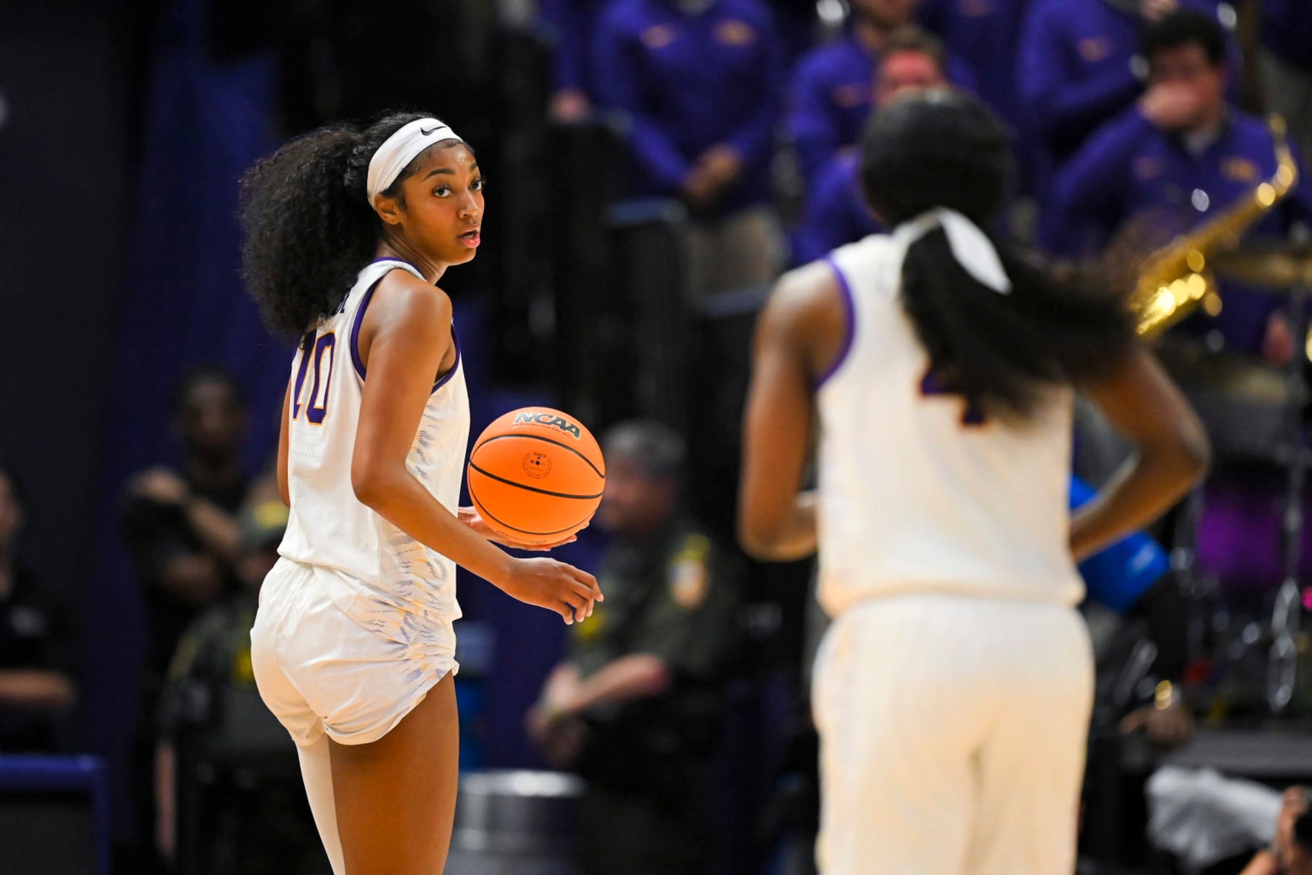 BATON ROUGE, LOUISIANA - MARCH 24: Angel Reese #10 of the LSU Tigers looks to Flau'jae Johnson #4 of the LSU Tigers during the third quarter  against the Middle Tennessee Blue Raiders during the second round of the 2024 NCAA Women's Basketball Tournament held at Pete Maravich Assembly Center on March 24, 2024 in Baton Rouge, Louisiana. (Photo by Andy Hancock/NCAA Photos/NCAA Photos via Getty Images)