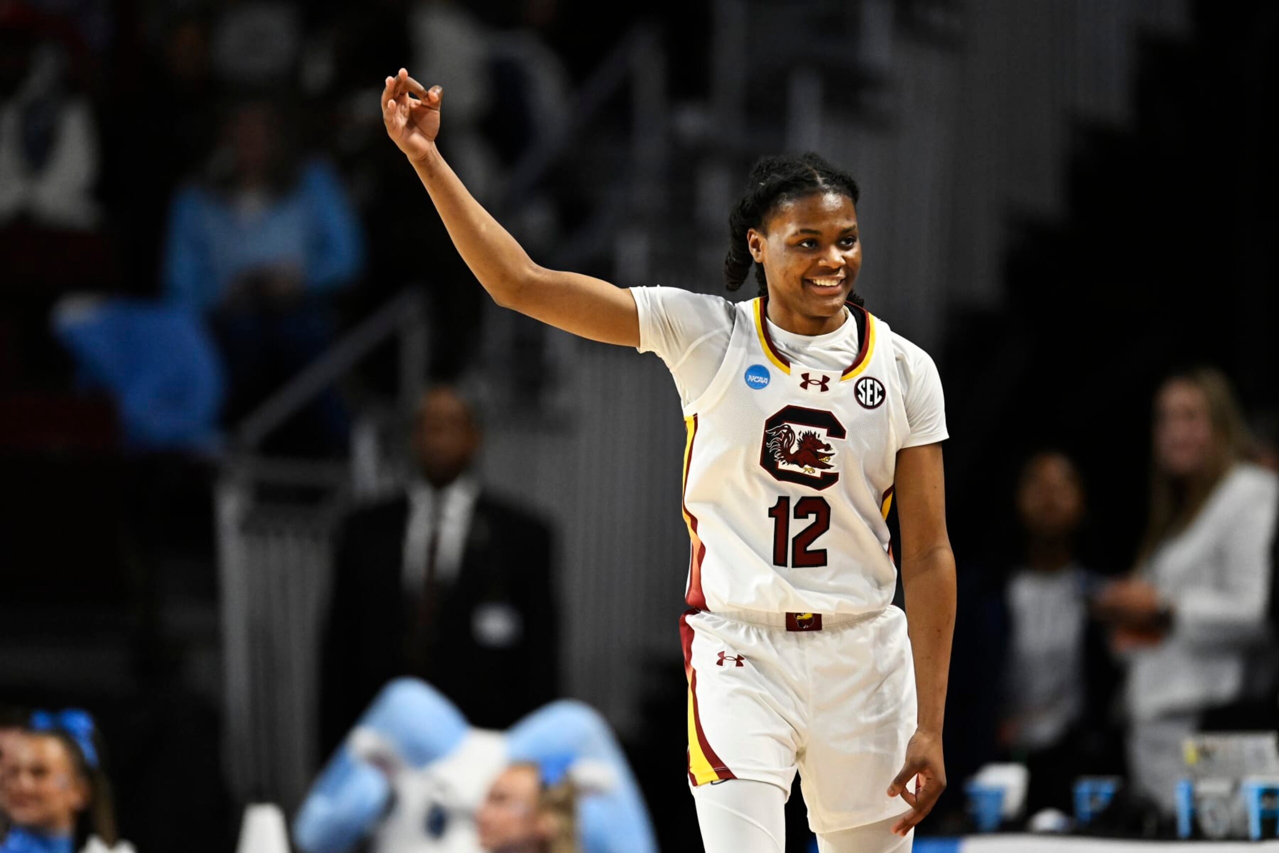 COLUMBIA, SOUTH CAROLINA - MARCH 24: MiLaysia Fulwiley #12 of the South Carolina Gamecocks celebrates her three point basket against the North Carolina Tar Heels in the second quarter during the second round of the NCAA Women’s Basketball Tournament at Colonial Life Arena on March 24, 2024 in Columbia, South Carolina. (Photo by Eakin Howard/Getty Images)