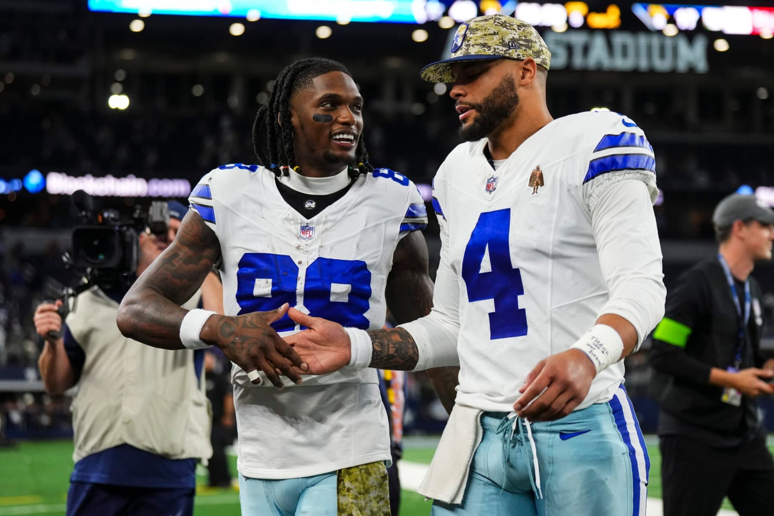 Dallas Cowboys wide receiver CeeDee Lamb (left) and quarterback Dak Prescott. Dallas Cowboys wide receiver CeeDee Lamb (left) and quarterback Dak Prescott.