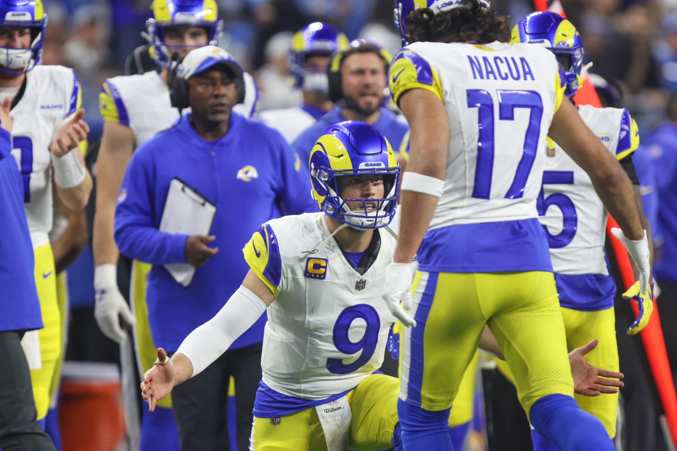 DETROIT, MI - JANUARY 14: Los Angeles Rams quarterback Matthew Stafford (9) congratulates Los Angeles Rams wide receiver Puka Nacua (17) after Nacua scored a touchdown on a catch-and-run play during an NFL NFC Wild Card playoff football game between the Los Angeles Rams and the Detroit Lions on January 14, 2024 at Ford Field in Detroit, Michigan. (Photo by Scott W. Grau/Icon Sportswire via Getty Images) DETROIT, MI - JANUARY 14: Los Angeles Rams quarterback Matthew Stafford (9) congratulates Los Angeles Rams wide receiver Puka Nacua (17) after Nacua scored a touchdown on a catch-and-run play during an NFL NFC Wild Card playoff football game between the Los Angeles Rams and the Detroit Lions on January 14, 2024 at Ford Field in Detroit, Michigan. (Photo by Scott W. Grau/Icon Sportswire via Getty Images)