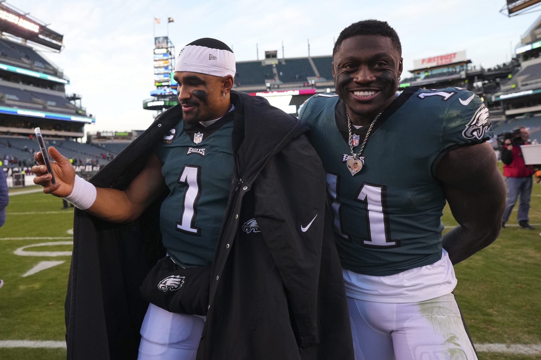 PHILADELPHIA, PA - DECEMBER 04: Jalen Hurts #1 and A.J. Brown #11 of the Philadelphia Eagles react after the game against the Tennessee Titans at Lincoln Financial Field on December 4, 2022 in Philadelphia, Pennsylvania. (Photo by Mitchell Leff/Getty Images)