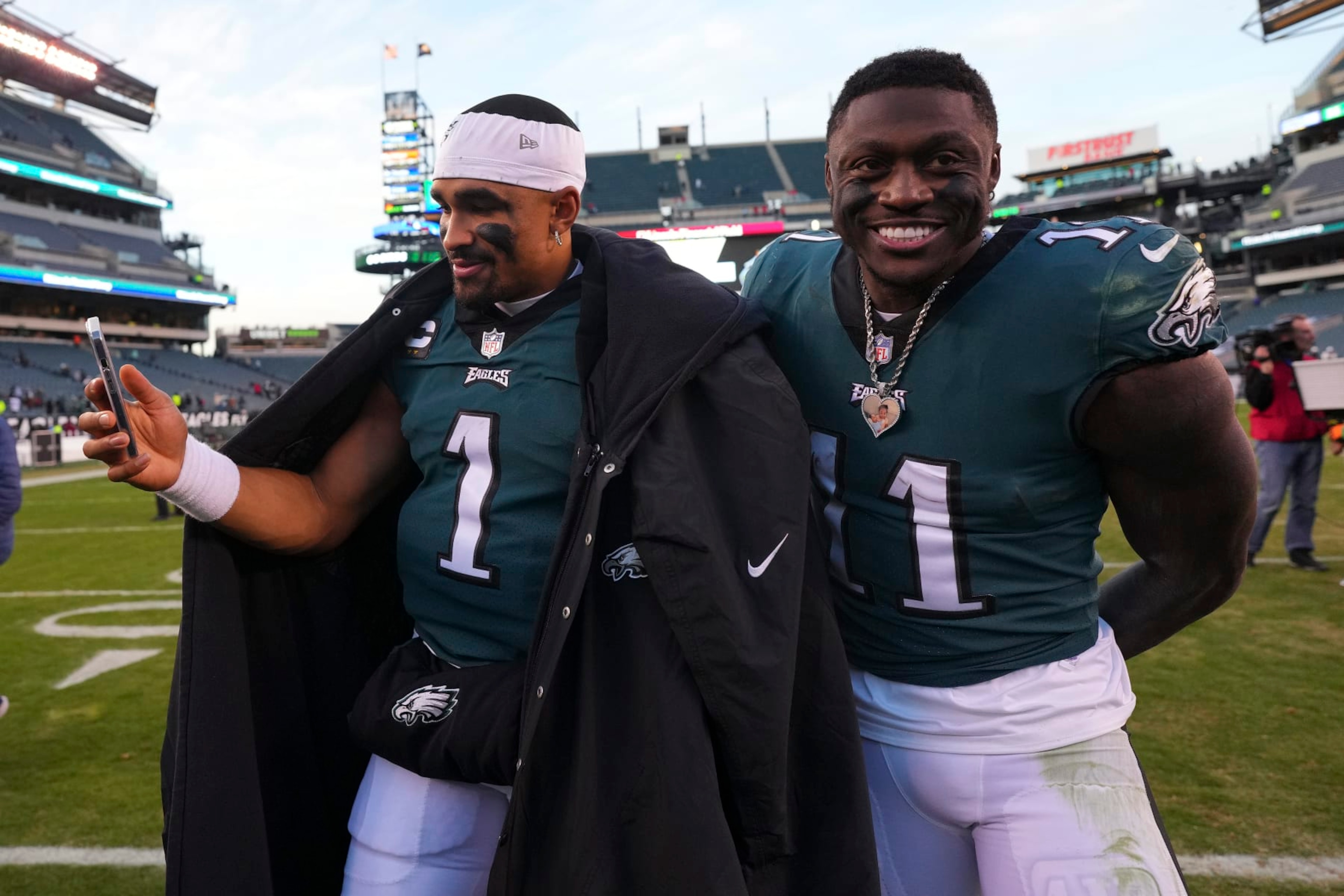 PHILADELPHIA, PA - DECEMBER 04: Jalen Hurts #1 and A.J. Brown #11 of the Philadelphia Eagles react after the game against the Tennessee Titans at Lincoln Financial Field on December 4, 2022 in Philadelphia, Pennsylvania. (Photo by Mitchell Leff/Getty Images)