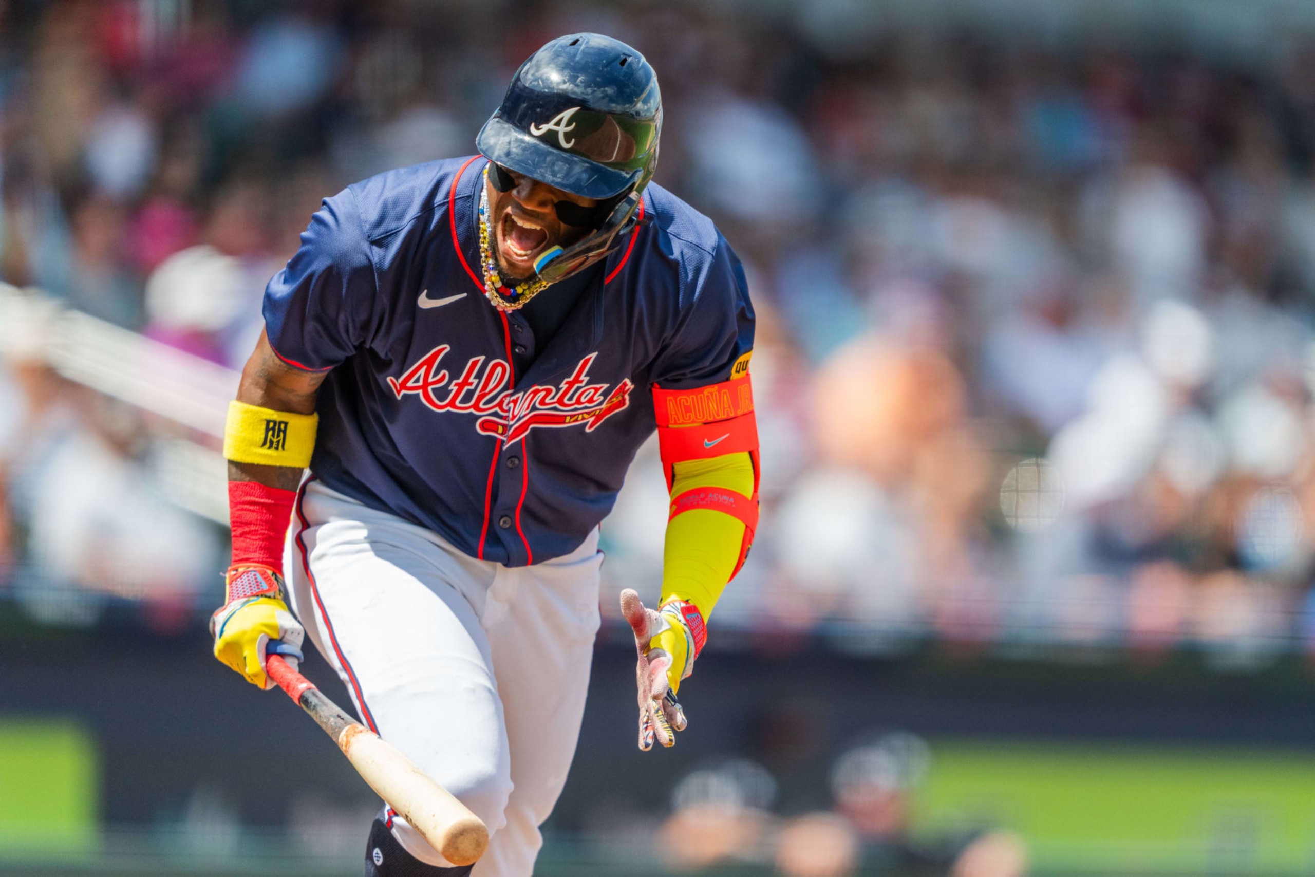 NORTH PORT, FLORIDA - MARCH 21: Ronald Acuña Jr. #13 of the Atlanta Braves celebrates after hitting an RBI single in the fifth inning during a Grapefruit League spring training game against the New York Yankees at CoolToday Park on March 21, 2024 in North Port, Florida. (Photo by Matthew Grimes Jr./Atlanta Braves/Getty Images)