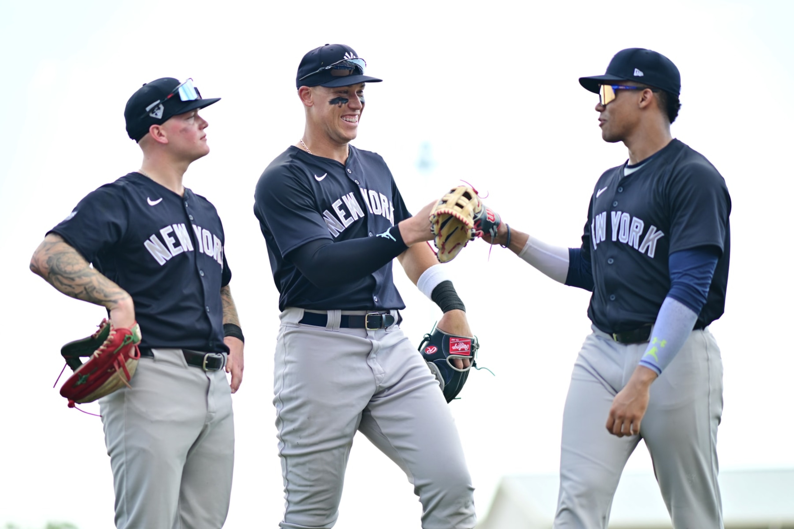 DUNEDIN, FLORIDA - MARCH 08: (L-R) Alex Verdugo #24, Aaron Judge #99, and Juan Soto #22 of the New York Yankees react following the fifth inning against the Toronto Blue Jays during a 2024 Grapefruit League Spring Training game at TD Ballpark on March 08, 2024 in Dunedin, Florida. (Photo by Julio Aguilar/Getty Images)