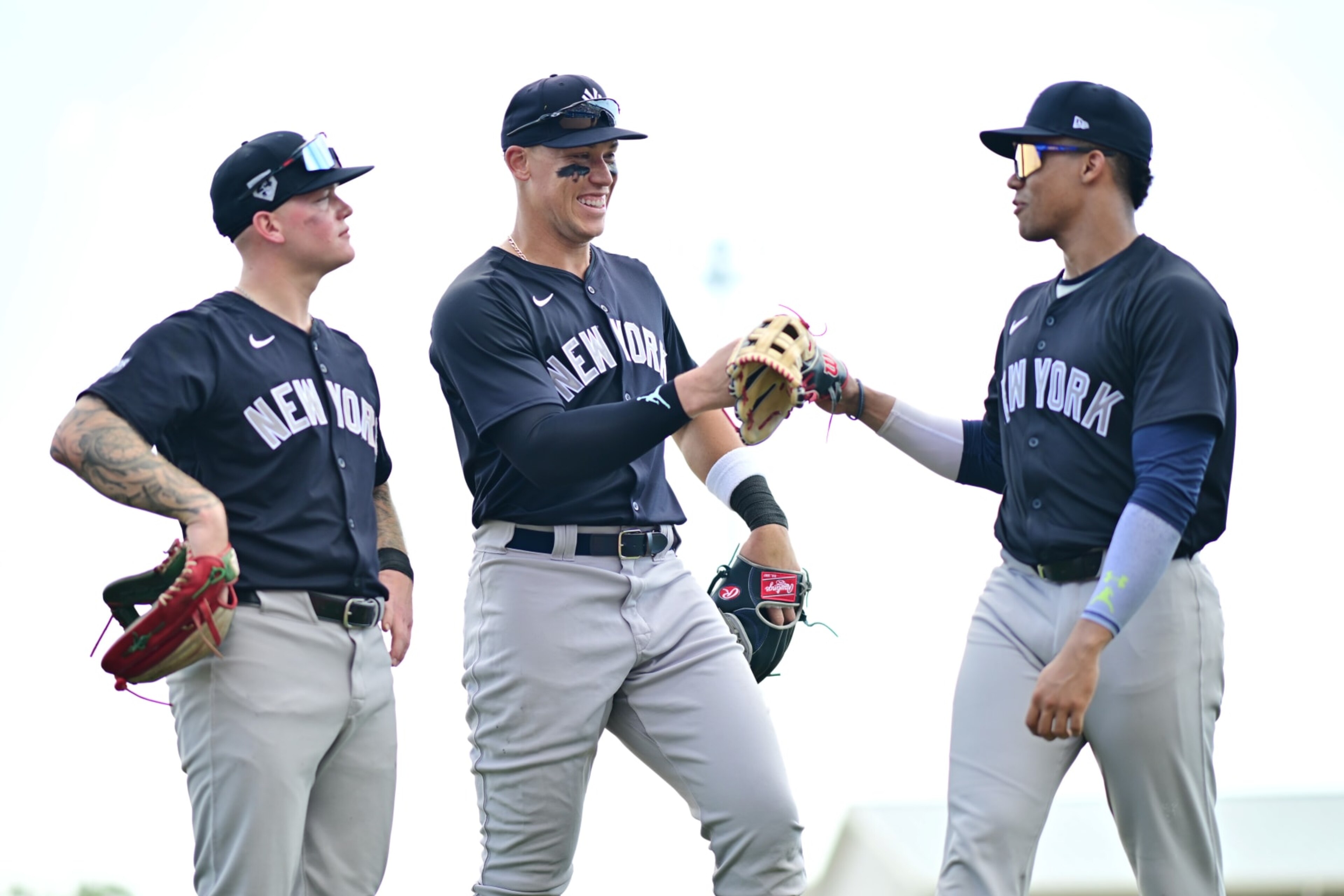 DUNEDIN, FLORIDA - MARCH 08: (L-R) Alex Verdugo #24, Aaron Judge #99, and Juan Soto #22 of the New York Yankees react following the fifth inning against the Toronto Blue Jays during a 2024 Grapefruit League Spring Training game at TD Ballpark on March 08, 2024 in Dunedin, Florida. (Photo by Julio Aguilar/Getty Images)