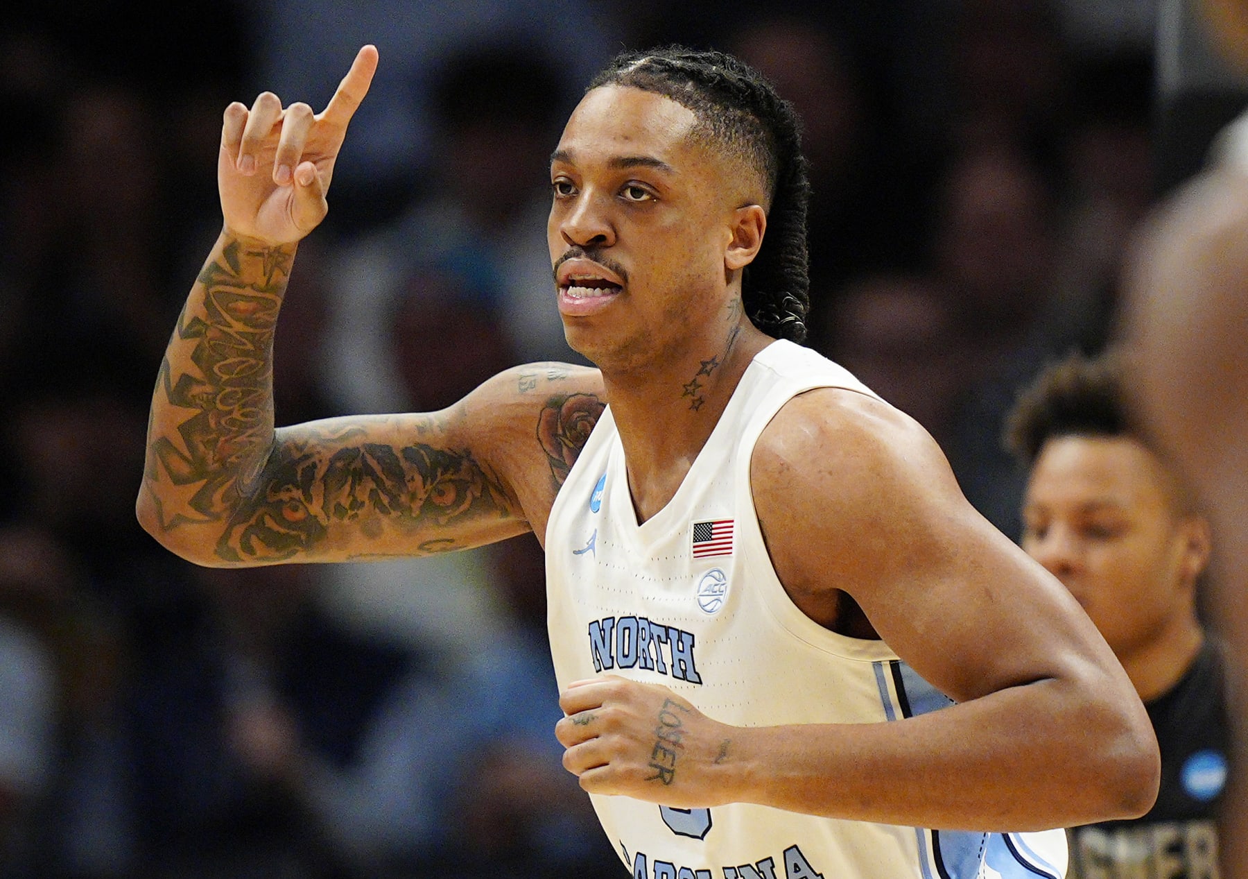 CHARLOTTE, NORTH CAROLINA - MARCH 21: Armando Bacot #5 of the North Carolina Tar Heels reacts against the Wagner Seahawks during the first half in the first round of the NCAA Men's Basketball Tournament at Spectrum Center on March 21, 2024 in Charlotte, North Carolina. (Photo by Jacob Kupferman/Getty Images)