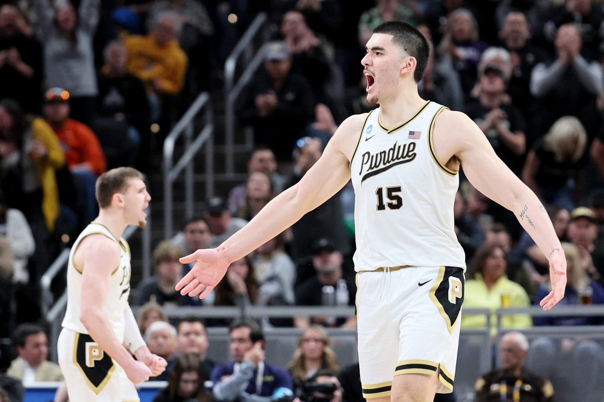 INDIANAPOLIS, INDIANA - MARCH 24: Zach Edey #15 of the Purdue Boilermakers celebrates a basket against the Utah State Aggies during the second half in the second round of the NCAA Men's Basketball Tournament at Gainbridge Fieldhouse on March 24, 2024 in Indianapolis, Indiana. (Photo by Andy Lyons/Getty Images)