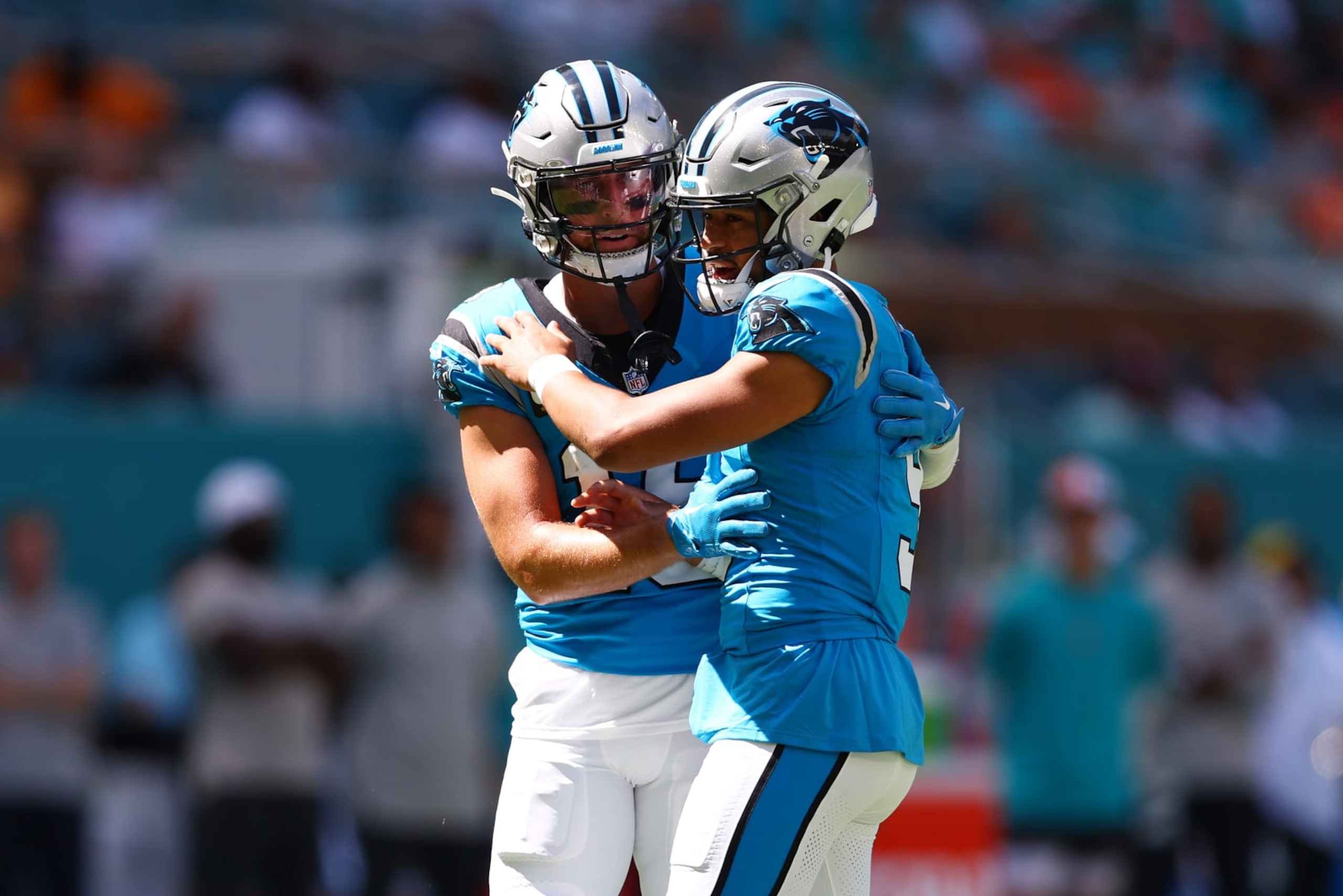 MIAMI GARDENS, FLORIDA - OCTOBER 15: Bryce Young #9 and Adam Thielen #19 of the Carolina Panthers celebrate a touchdown  during the first quarter in the game against the Miami Dolphins at Hard Rock Stadium on October 15, 2023 in Miami Gardens, Florida. (Photo by Megan Briggs/Getty Images)