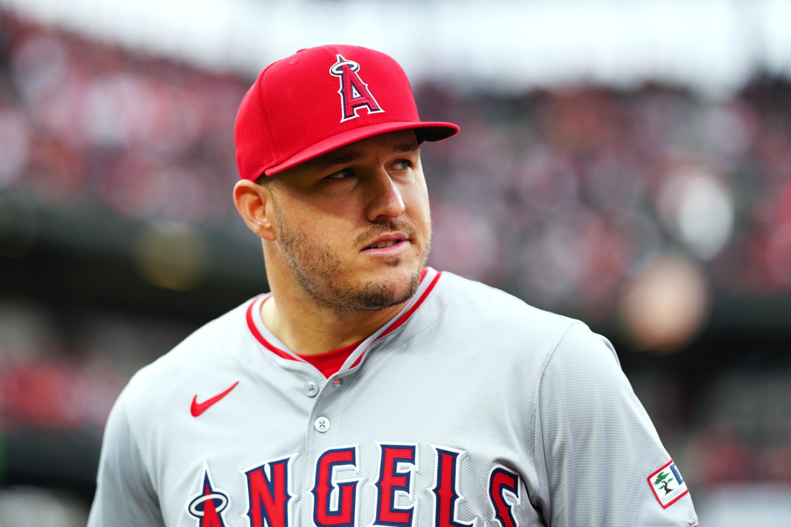 BALTIMORE, MD - MARCH 28:  Mike Trout #27 of the Los Angeles Angels looks on during pregame ceremonies prior to the game between the Los Angeles Angels and the Baltimore Orioles at Oriole Park at Camden Yards on Thursday, March 28, 2024 in Baltimore, Maryland. (Photo by Daniel Shirey/MLB Photos via Getty Images)
