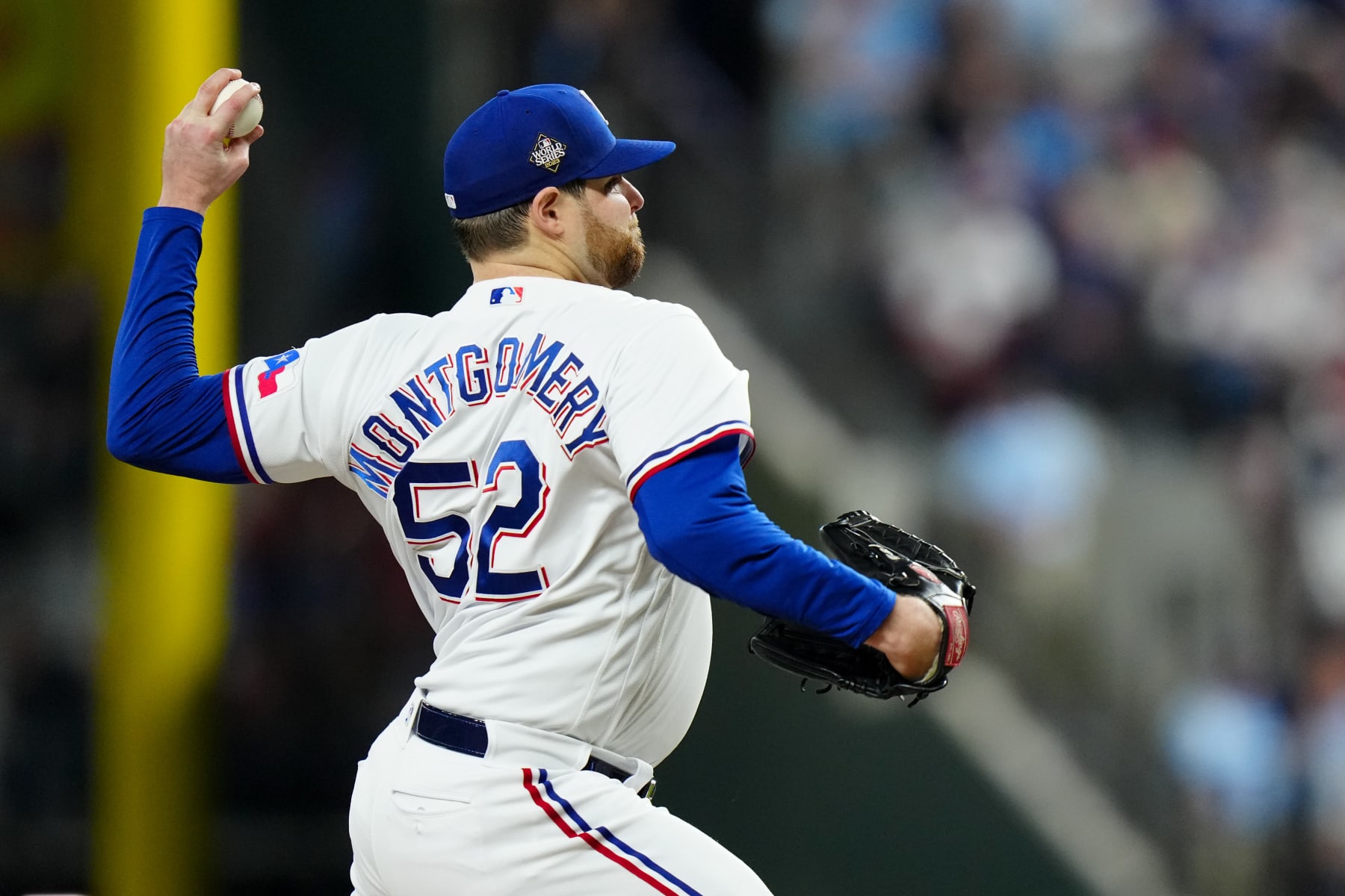 ARLINGTON, TX - OCTOBER 28:   Jordan Montgomery #52 of the Texas Rangers pitches during Game 2 of the 2023 World Series between the Arizona Diamondbacks and the Texas Rangers at Globe Life Field on Saturday, October 28, 2023 in Arlington, Texas. (Photo by Daniel Shirey/MLB Photos via Getty Images)