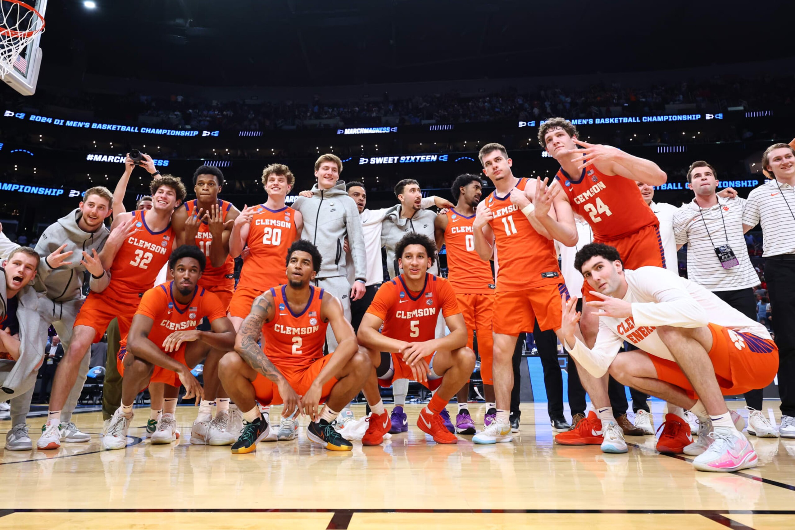 LOS ANGELES, CALIFORNIA - MARCH 28: The Clemson Tigers celebrate a 77-72 win in the Sweet Sixteen round of the 2024 NCAA Men's Basketball Tournament held at Crypto.com Arena on March 28, 2024 in Los Angeles, California. (Photo by C. Morgan Engel/NCAA Photos via Getty Images)