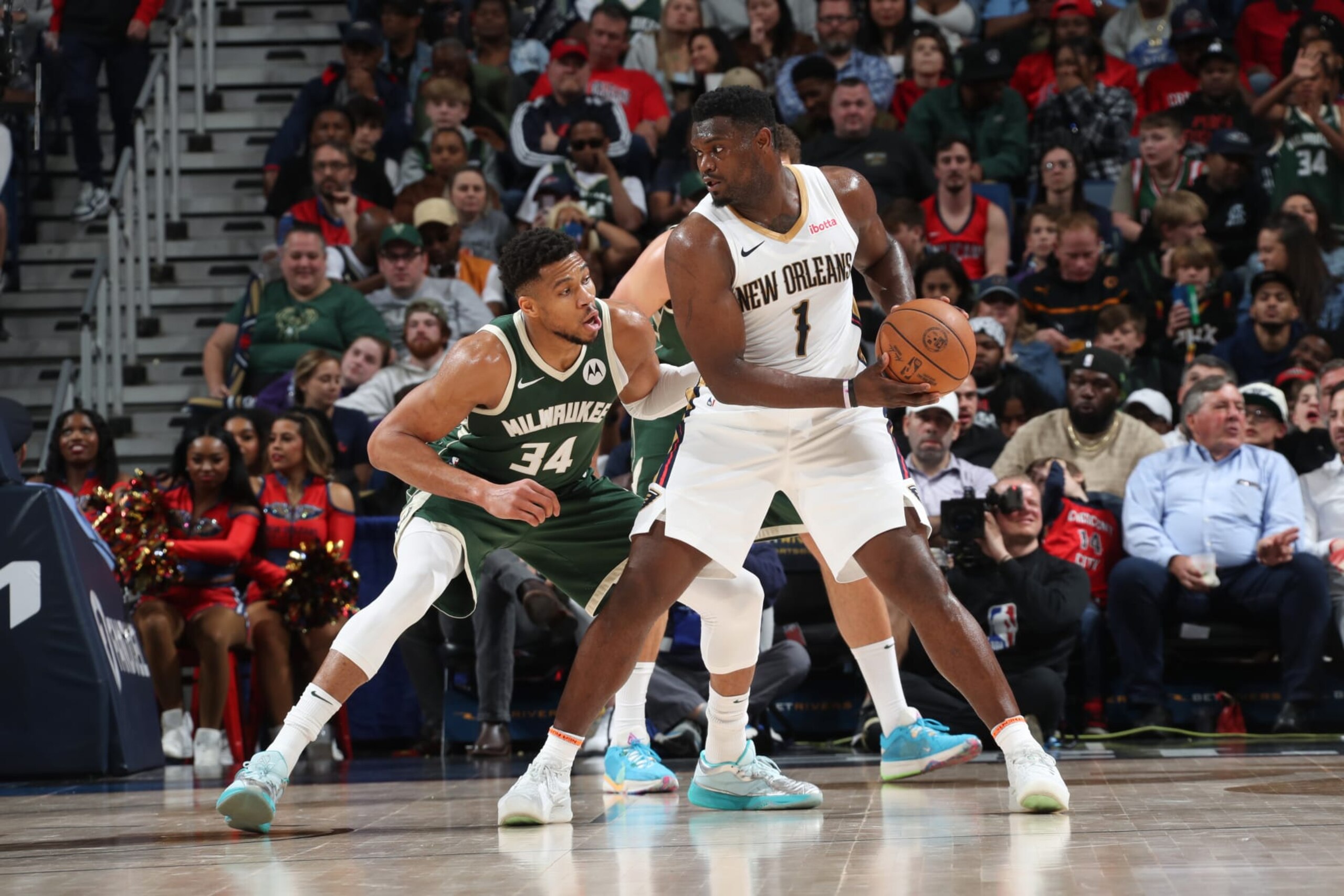 NEW ORLEANS, LA - MARCH 28: Giannis Antetokounmpo #34 of the Milwaukee Bucks plays defense during the game  against Zion Williamson #1 of the New Orleans Pelicans on March 28, 2024 at the Smoothie King Center in New Orleans, Louisiana. NOTE TO USER: User expressly acknowledges and agrees that, by downloading and or using this Photograph, user is consenting to the terms and conditions of the Getty Images License Agreement. Mandatory Copyright Notice: Copyright 2024 NBAE (Photo by Layne Murdoch Jr./NBAE via Getty Images)