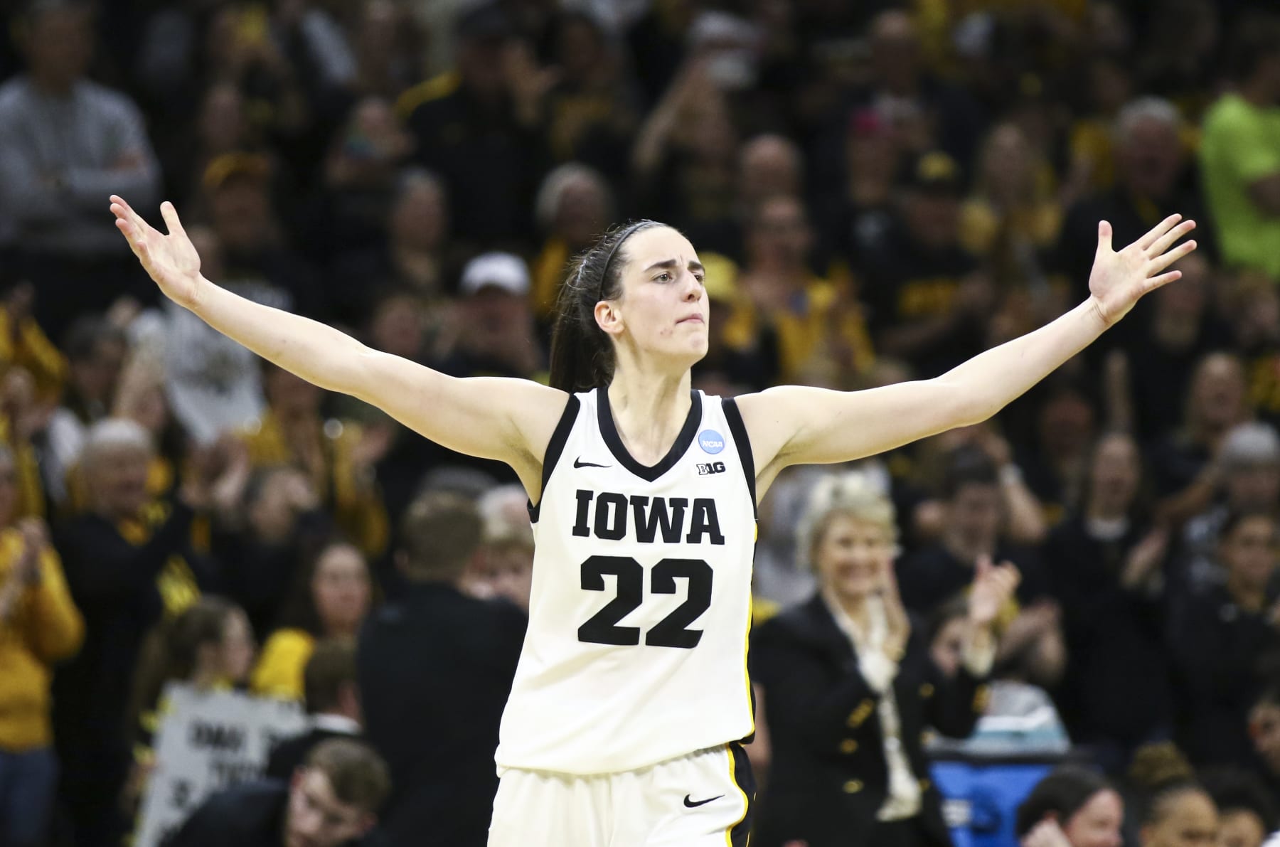 IOWA CITY, IOWA- MARCH 25: Guard Caitlin Clark #22 of the Iowa Hawkeyes celebrates after drawing a foul late in the second half against the West Virginia Mountaineers during their second round match-up in the 2024 NCAA Division 1 Womens Basketball Championship at Carver-Hawkeye Arena on March 25, 2024 in Iowa City, Iowa. (Photo by Matthew Holst/Getty Images) IOWA CITY, IOWA- MARCH 25: Guard Caitlin Clark #22 of the Iowa Hawkeyes celebrates after drawing a foul late in the second half against the West Virginia Mountaineers during their second round match-up in the 2024 NCAA Division 1 Womens Basketball Championship at Carver-Hawkeye Arena on March 25, 2024 in Iowa City, Iowa. (Photo by Matthew Holst/Getty Images)