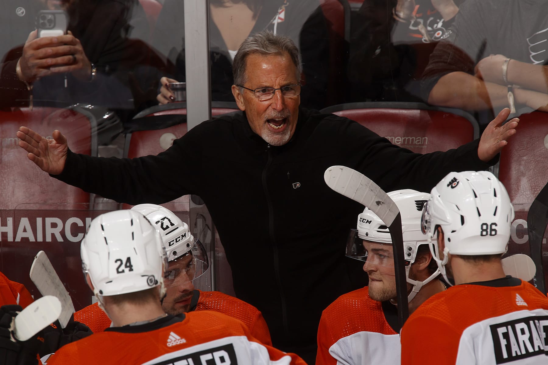 SUNRISE, FLORIDA - FEBRUARY 6: Philadelphia Flyers Head Coach John Tortorella gives his team instructions during a break in the action against the Florida Panthers at the Amerant Bank Arena on February 6, 2024 in Sunrise, Florida. (Photo by Eliot J. Schechter/NHLI via Getty Images)