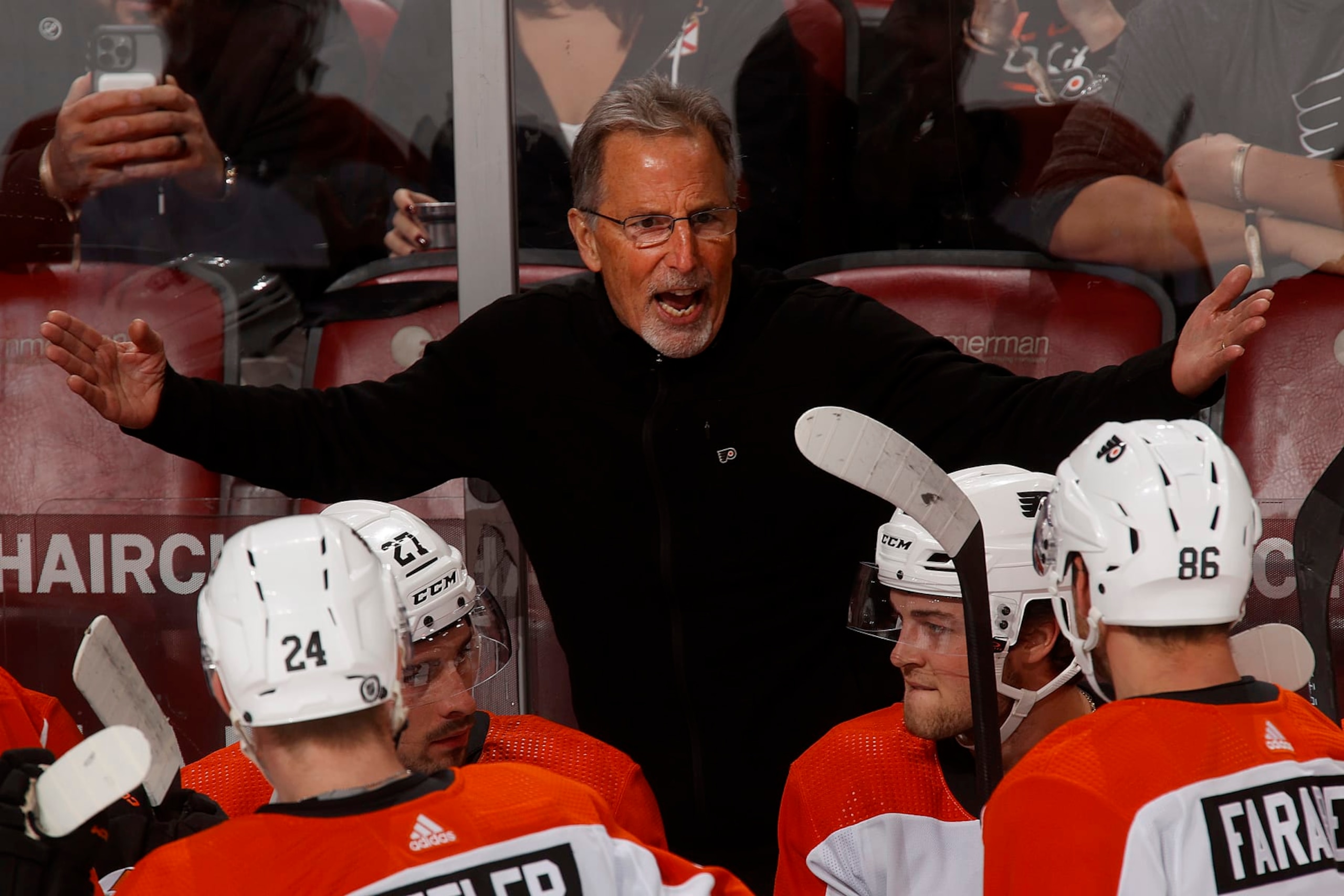 SUNRISE, FLORIDA - FEBRUARY 6: Philadelphia Flyers Head Coach John Tortorella gives his team instructions during a break in the action against the Florida Panthers at the Amerant Bank Arena on February 6, 2024 in Sunrise, Florida. (Photo by Eliot J. Schechter/NHLI via Getty Images)
