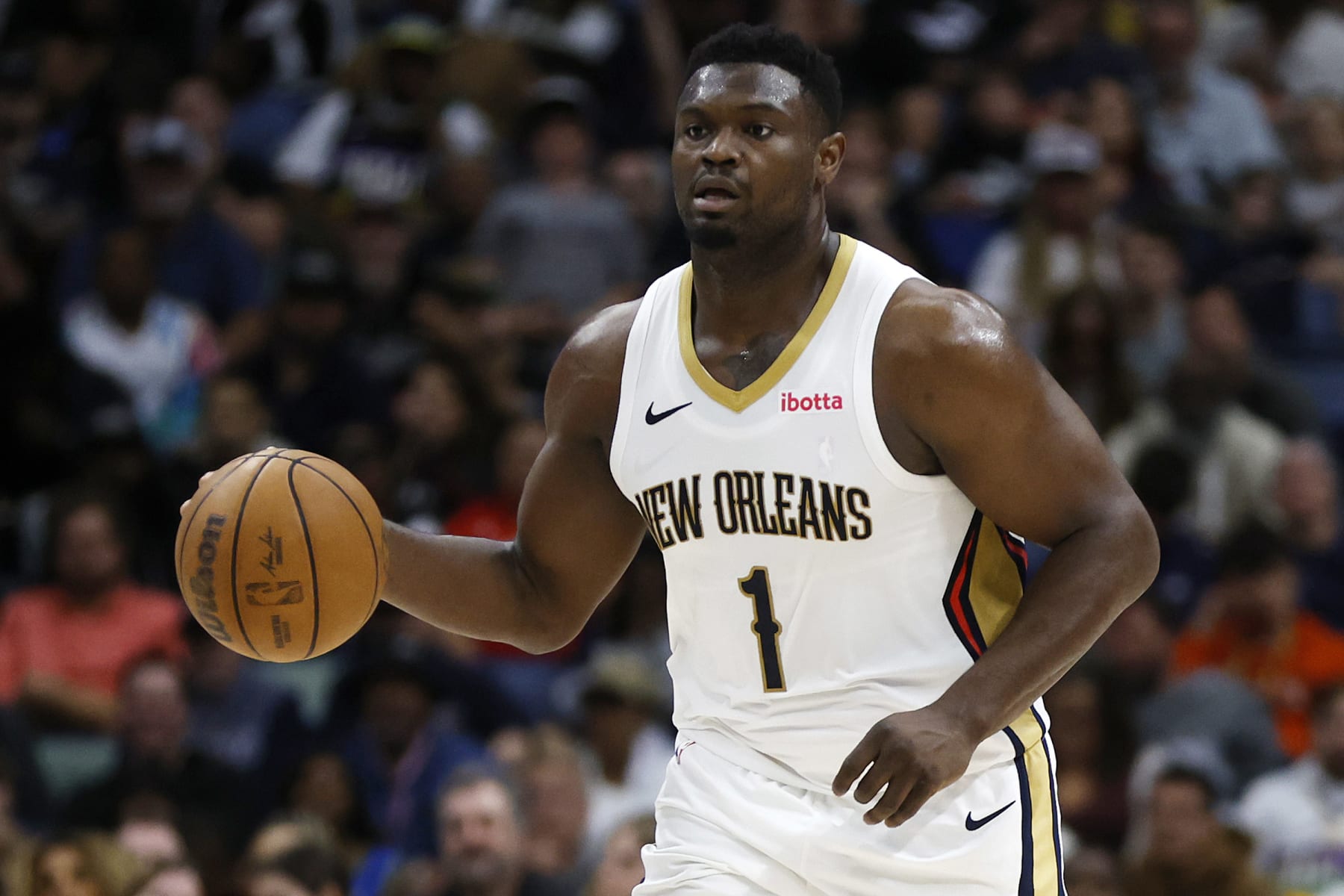 NEW ORLEANS, LOUISIANA - MARCH 28: Zion Williamson #1 of the New Orleans Pelicans drives the ball up the court against the Milwaukee Bucks at Smoothie King Center on March 28, 2024 in New Orleans, Louisiana. NOTE TO USER: User expressly acknowledges and agrees that, by downloading and or using this photograph, User is consenting to the terms and conditions of the Getty Images License Agreement.  (Photo by Chris Graythen/Getty Images)