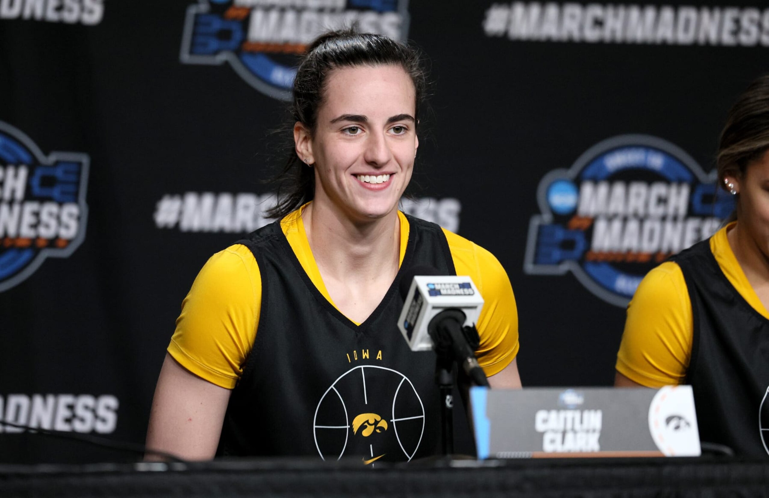 ALBANY, NEW YORK - MARCH 29: Caitlin Clark #22 of the Iowa Hawkeyes talks to the media following practice for the NCAA Women's Basketball Tournament - Albany Regional at MVP Arena on March 29, 2024 in Albany, New York. (Photo by Andy Lyons/Getty Images) ALBANY, NEW YORK - MARCH 29: Caitlin Clark #22 of the Iowa Hawkeyes talks to the media following practice for the NCAA Women's Basketball Tournament - Albany Regional at MVP Arena on March 29, 2024 in Albany, New York. (Photo by Andy Lyons/Getty Images)