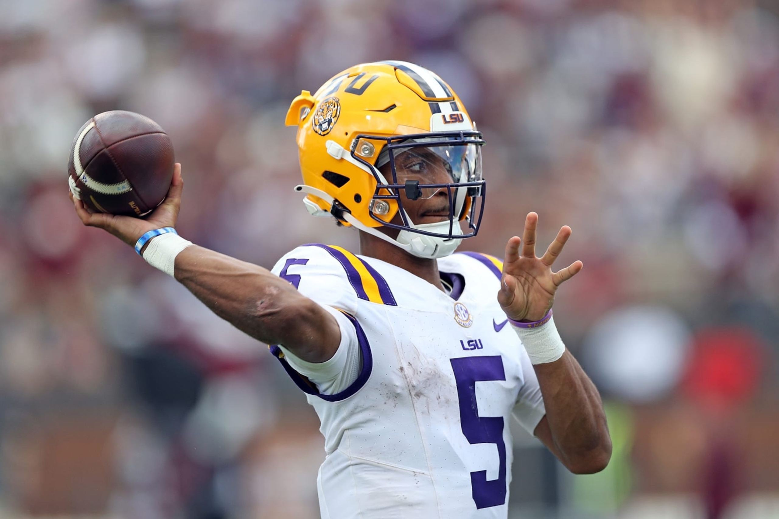 STARKVILLE, MISSISSIPPI - SEPTEMBER 16: Jayden Daniels #5 of the LSU Tigers looks to pass during the game against the Mississippi State Bulldogs at Davis Wade Stadium on September 16, 2023 in Starkville, Mississippi. (Photo by Justin Ford/Getty Images)