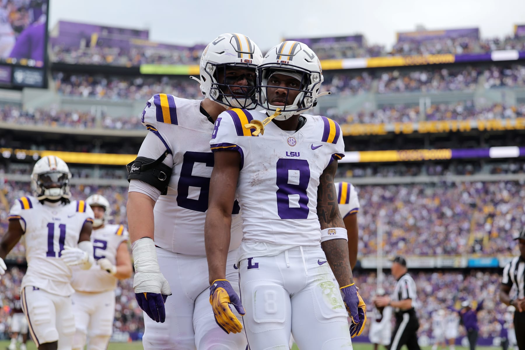 BATON ROUGE, LOUISIANA - NOVEMBER 25: Malik Nabers #8 of the LSU Tigers celebrates a touchdown against the Texas A&M Aggies during a game at Tiger Stadium on November 25, 2023 in Baton Rouge, Louisiana. (Photo by Jonathan Bachman/Getty Images)