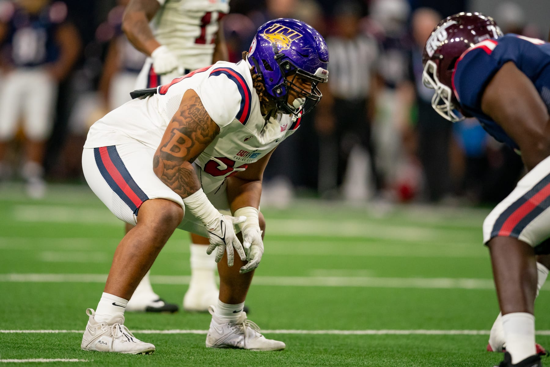 FRISCO, TX - FEBRUARY 01: East Team defensive lineman Khristian Boyd (99) of Northern Iowa gets set during the East-West Shrine Bowl game on February 1, 2024 at the Ford Center at the star in Frisco, TX. (Photo by Chris Leduc/Icon Sportswire via Getty Images)