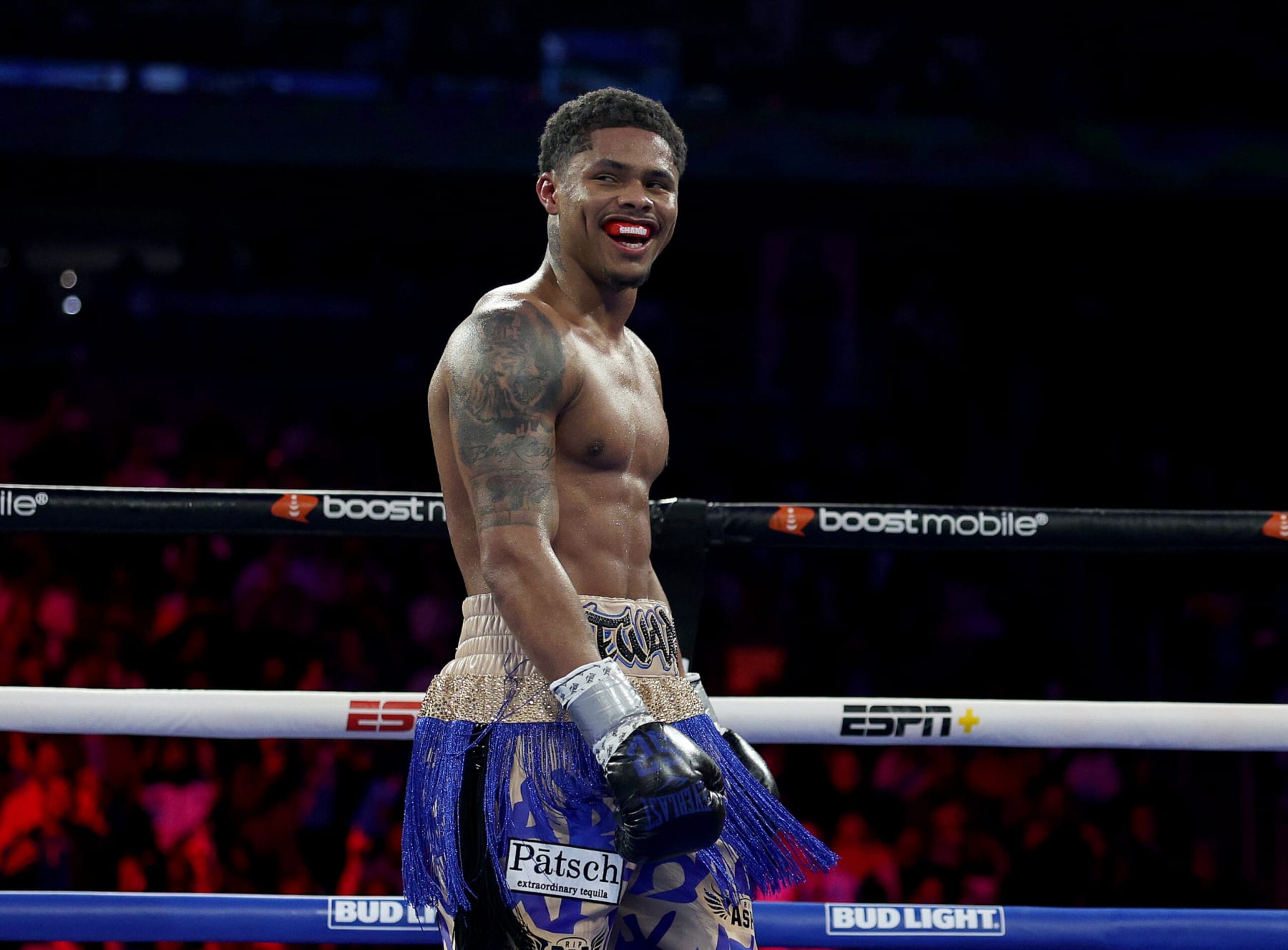 NEWARK, NEW JERSEY - APRIL 08: Shakur Stevenson of the United States is declared the winner by TKO after the fight is stopped at 1:35 in the sixth round against Shuichiro Yoshino of Japan during their WBC Lightweight Final Eliminator match at Prudential Center on April 08, 2023 in Newark, New Jersey. (Photo by Elsa/Getty Images)
