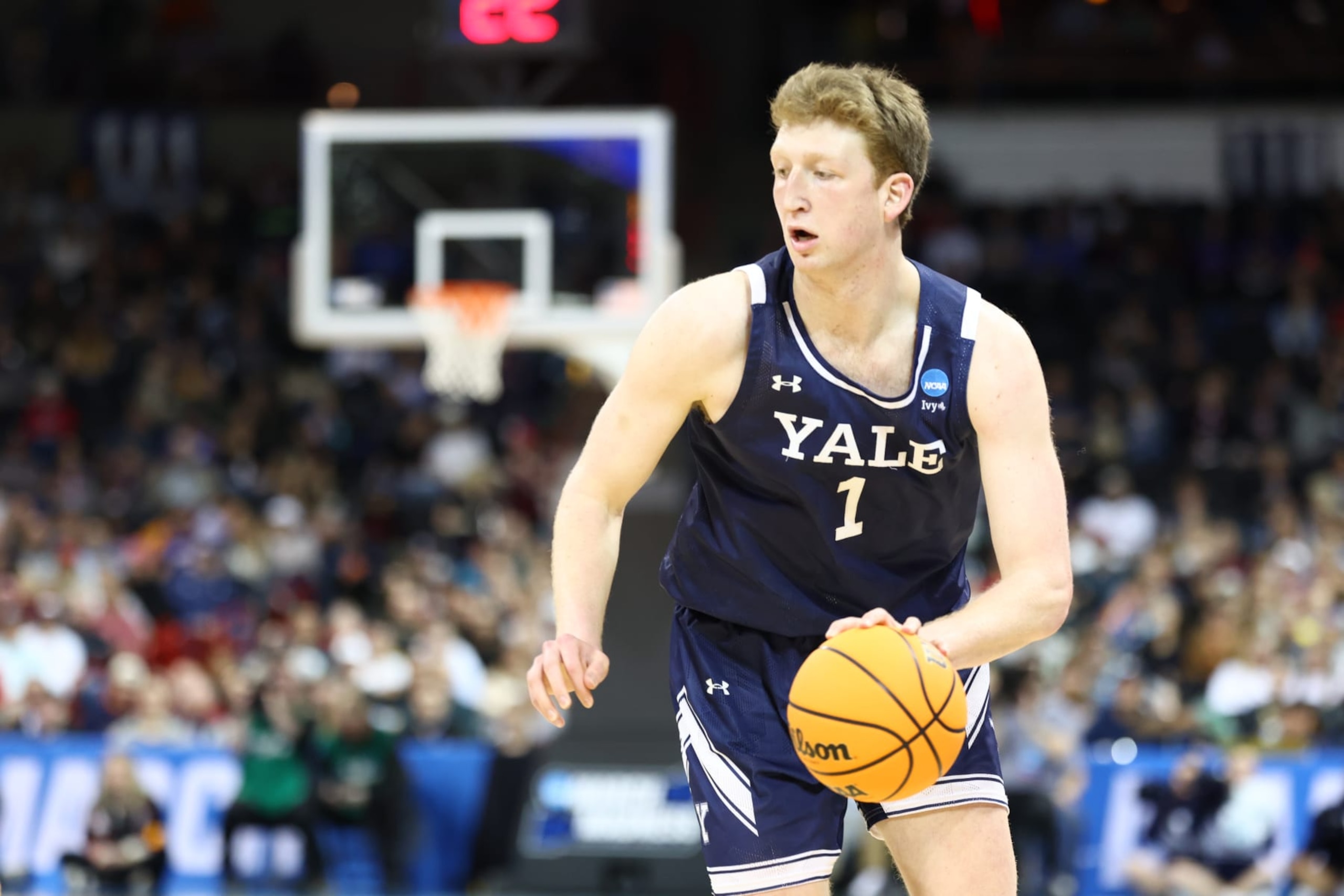 SPOKANE, WASHINGTON - MARCH 24: Danny Wolf #1 of the Yale Bulldogs dribbles up court against San Diego State Aztecs during the second round of the 2024 NCAA Men's Basketball Tournament held at Spokane Veterans Memorial Arena on March 24, 2024 in Spokane, Washington. (Photo by C. Morgan Engel/NCAA Photos via Getty Images) SPOKANE, WASHINGTON - MARCH 24: Danny Wolf #1 of the Yale Bulldogs dribbles up court against San Diego State Aztecs during the second round of the 2024 NCAA Men's Basketball Tournament held at Spokane Veterans Memorial Arena on March 24, 2024 in Spokane, Washington. (Photo by C. Morgan Engel/NCAA Photos via Getty Images)