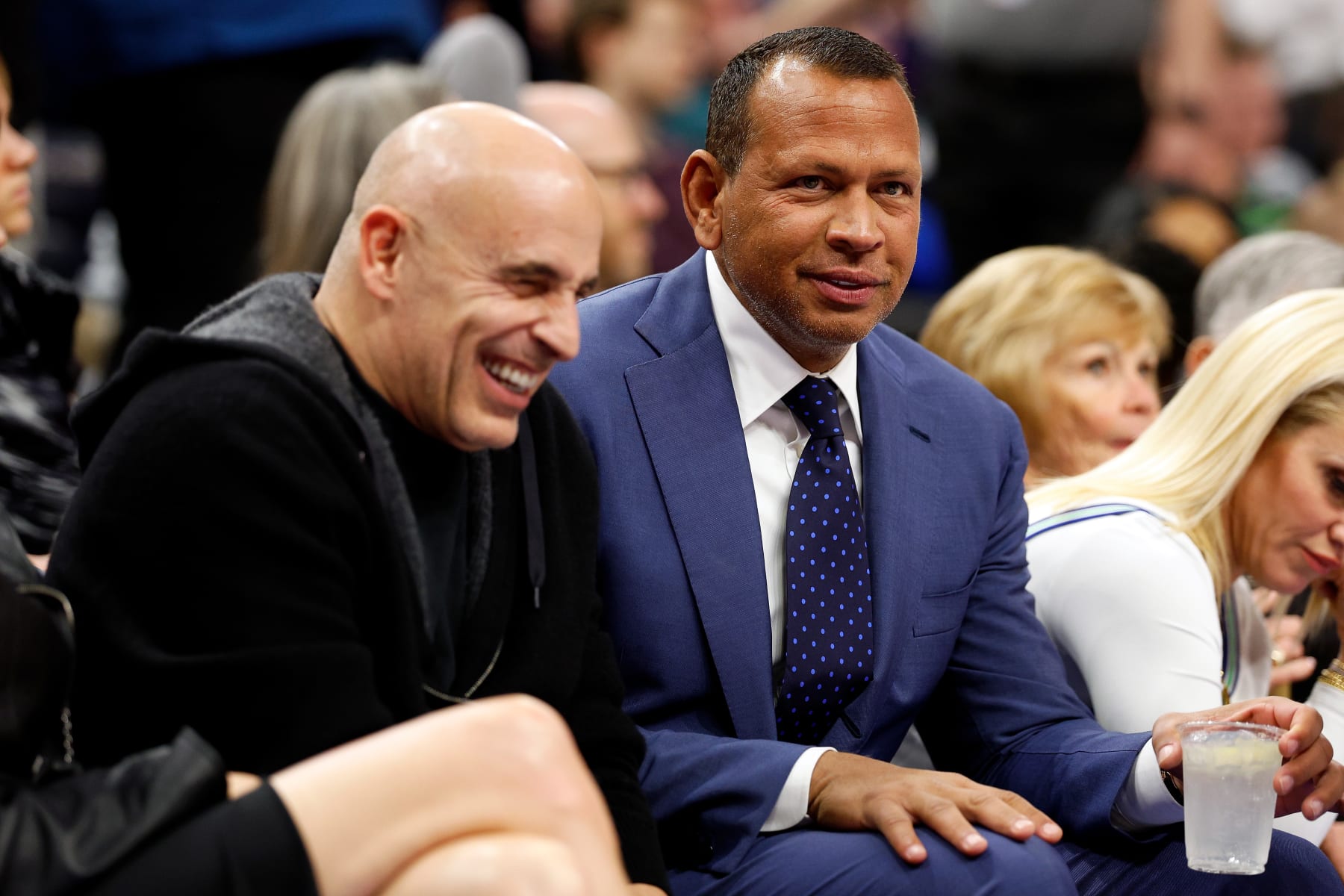 MINNEAPOLIS, MINNESOTA - DECEMBER 30: Co-owners Alex Rodriguez (R) and Marc Lore of the Minnesota Timberwolves look on in the second quarter during the game against the Los Angeles Lakers at Target Center on December 30, 2023 in Minneapolis, Minnesota. NOTE TO USER: User expressly acknowledges and agrees that, by downloading and or using this photograph, User is consenting to the terms and conditions of the Getty Images License Agreement. (Photo by David Berding/Getty Images)