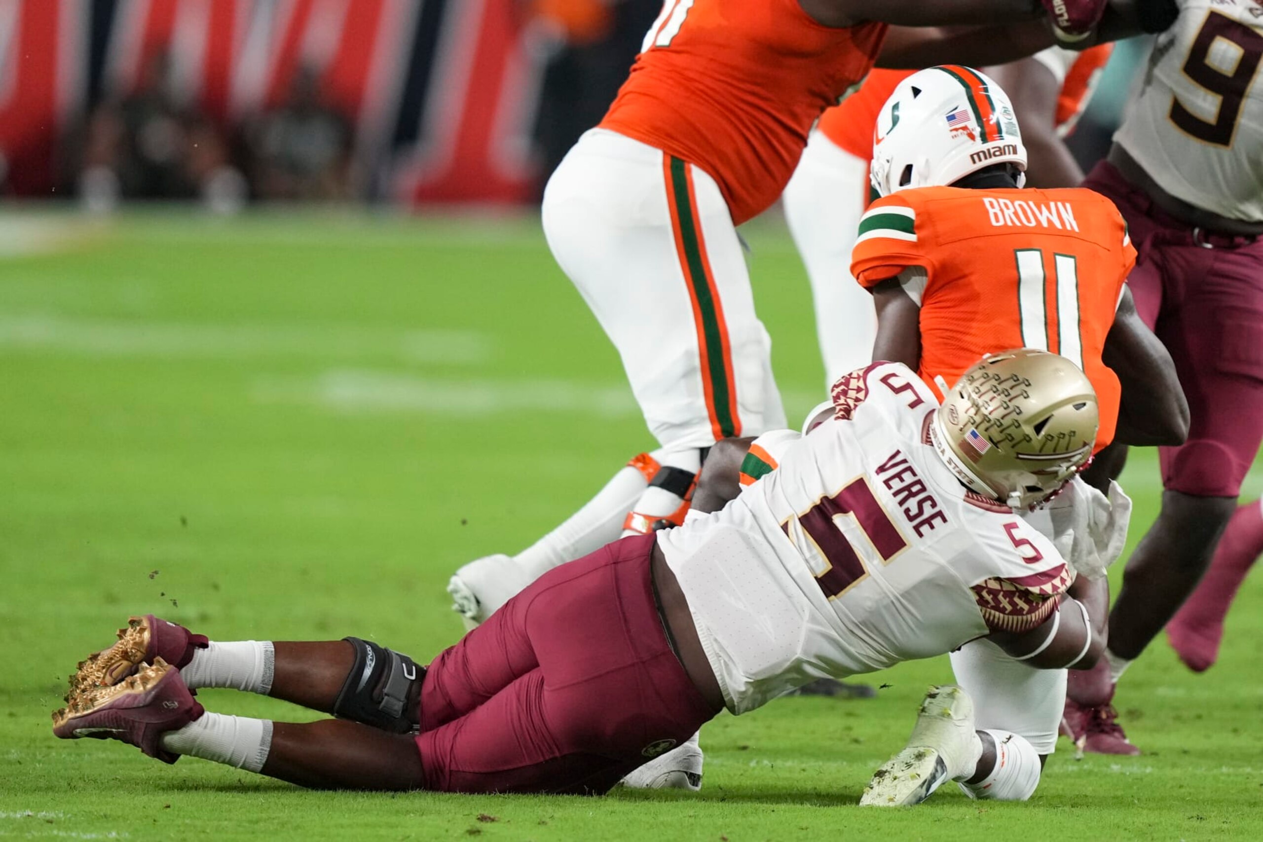 MIAMI GARDENS, FL - NOVEMBER 05: Jared Verse #5 of the Florida State Seminoles sacks Jacurri Brown #11 of the Miami Hurricanes during the second quarter at Hard Rock Stadium on November 5, 2022 in Miami Gardens, Florida. (Photo by Eric Espada/Getty Images) MIAMI GARDENS, FL - NOVEMBER 05: Jared Verse #5 of the Florida State Seminoles sacks Jacurri Brown #11 of the Miami Hurricanes during the second quarter at Hard Rock Stadium on November 5, 2022 in Miami Gardens, Florida. (Photo by Eric Espada/Getty Images)