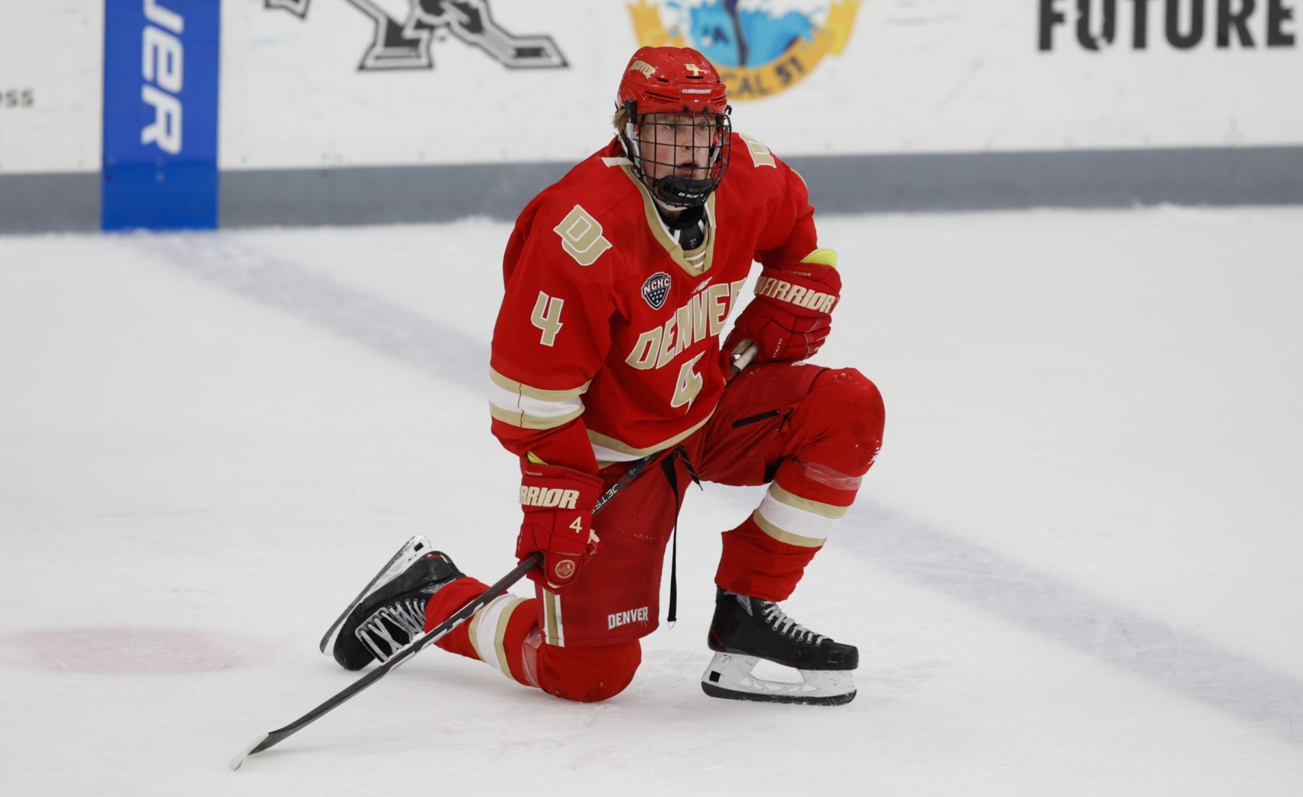 PROVIDENCE, RHODE ISLAND - OCTOBER 20: Jack Devine #4 of the Denver Pioneers skates against the Providence College Friars during NCAA hockey at the Schneider Arena on October 20, 2023 in Providence, Rhode Island. The Friars won 4-3. (Photo by Richard T Gagnon/Getty Images)