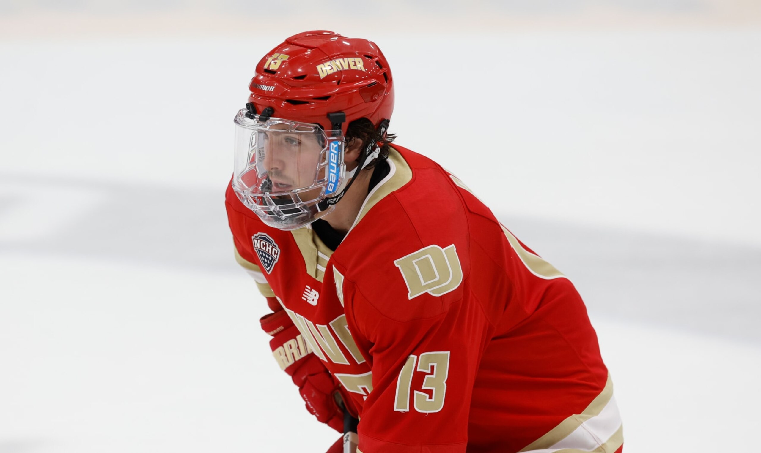 PROVIDENCE, RHODE ISLAND - OCTOBER 20: Massimo Rizzo #13 of the Denver Pioneers skates during the third period against the Providence College Friars during NCAA hockey at the Schneider Arena on October 20, 2023 in Providence, Rhode Island. The Friars won 4-3. (Photo by Richard T Gagnon/Getty Images)