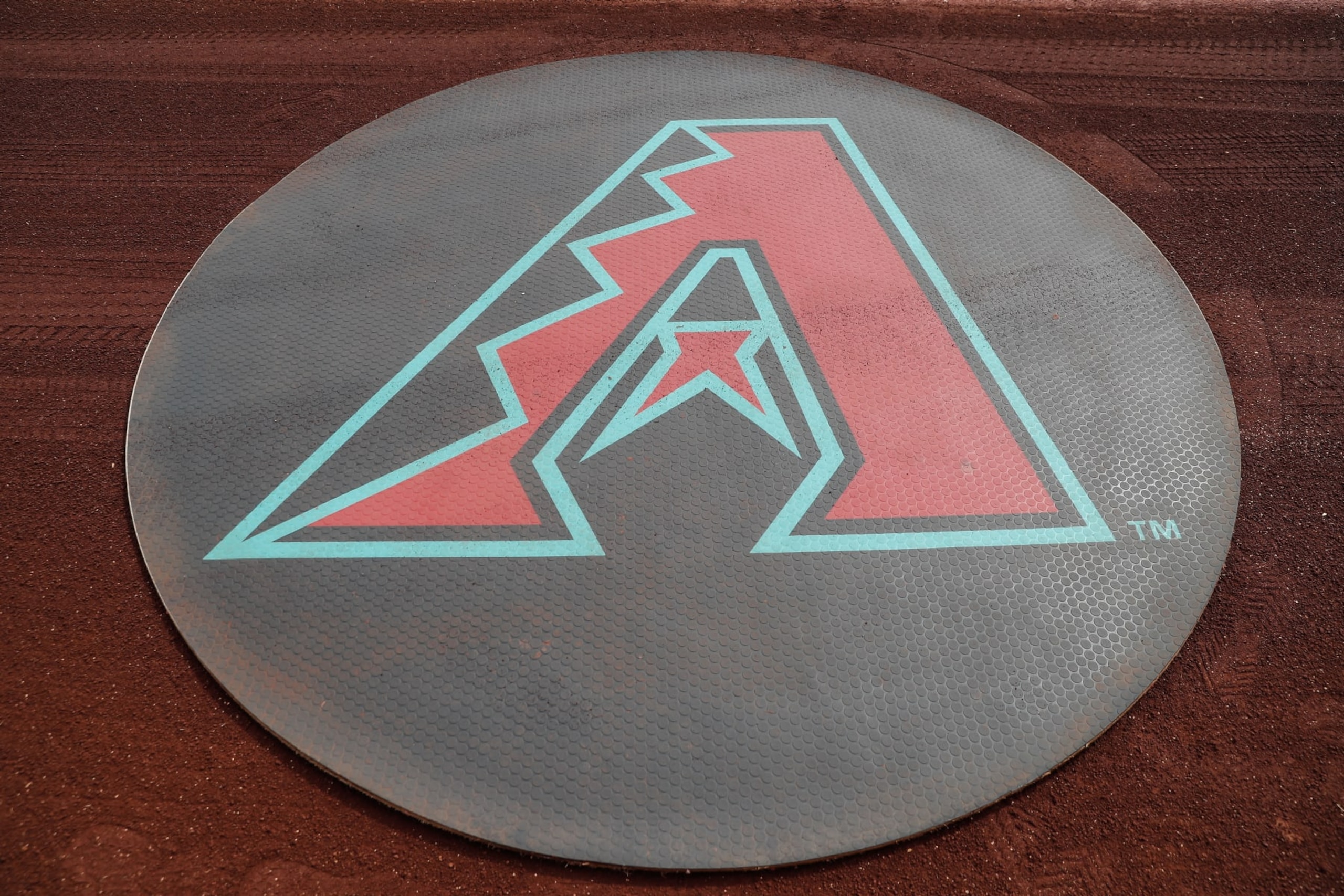 SCOTTSDALE, AZ - FEBRUARY 23:  The Arizona Diamondbacks logo on the warm up circle before the MLB spring training baseball game between the Arizona Diamondbacks and the Colorado Rockies on February 23, 2024 at Salt River Fields at Talking Stick in Scottsdale, Arizona. (Photo by Kevin Abele/Icon Sportswire via Getty Images)