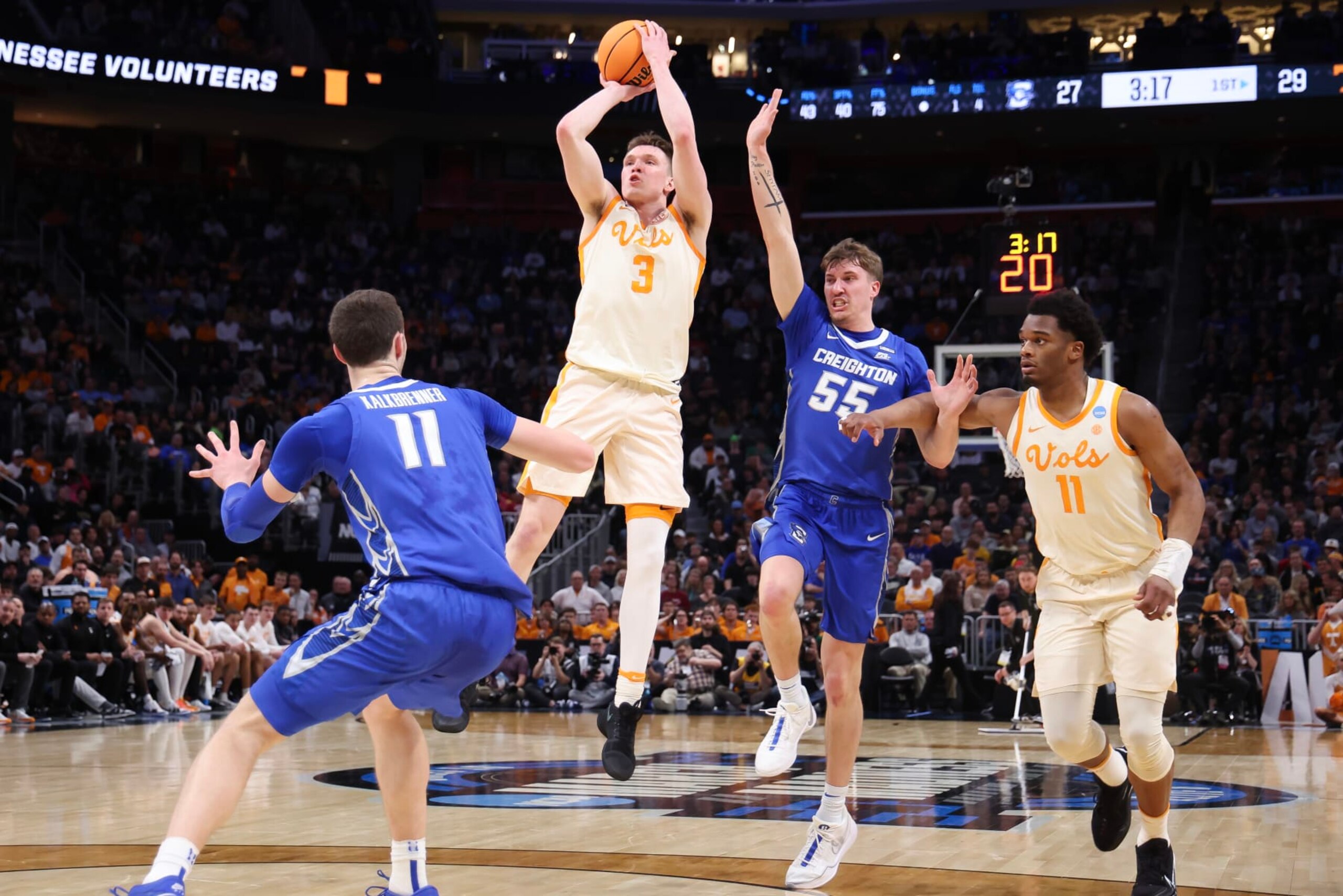 DETROIT, MICHIGAN - MARCH 29: Dalton Knecht #3 of the Tennessee Volunteers shoots the ball during the first half against Baylor Scheierman #55 of the Creighton Bluejays in the Sweet 16 round of the NCAA Men's Basketball Tournament at Little Caesars Arena on March 29, 2024 in Detroit, Michigan. (Photo by Gregory Shamus/Getty Images)
